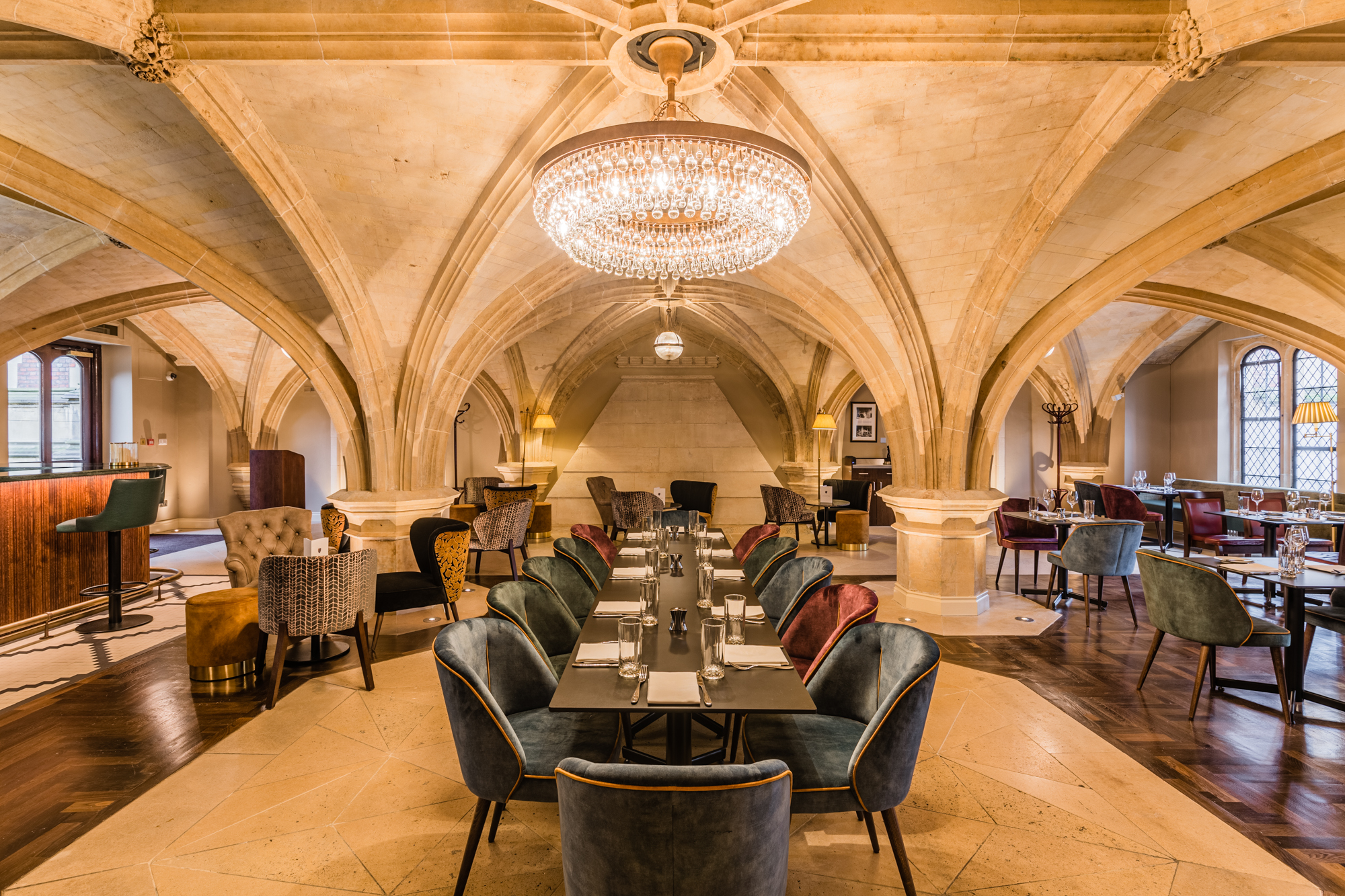 Elegant Members' Common Room with chandelier, perfect for upscale meetings and private dining.