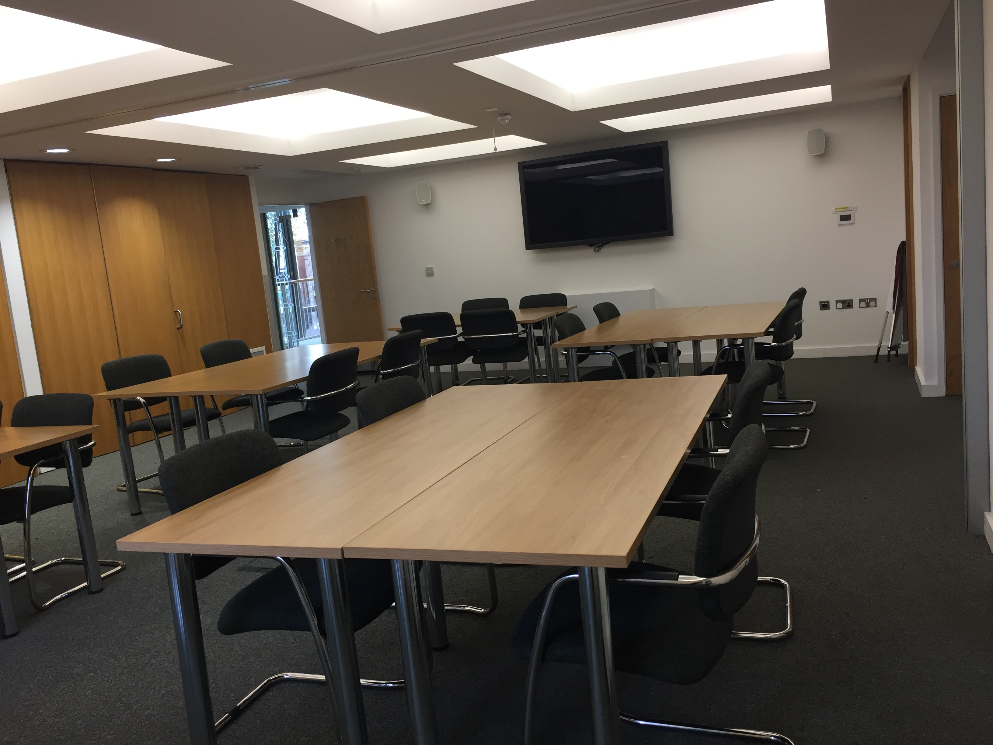 Versatile meeting space in St Barnabas Church, perfect for workshops and training sessions.