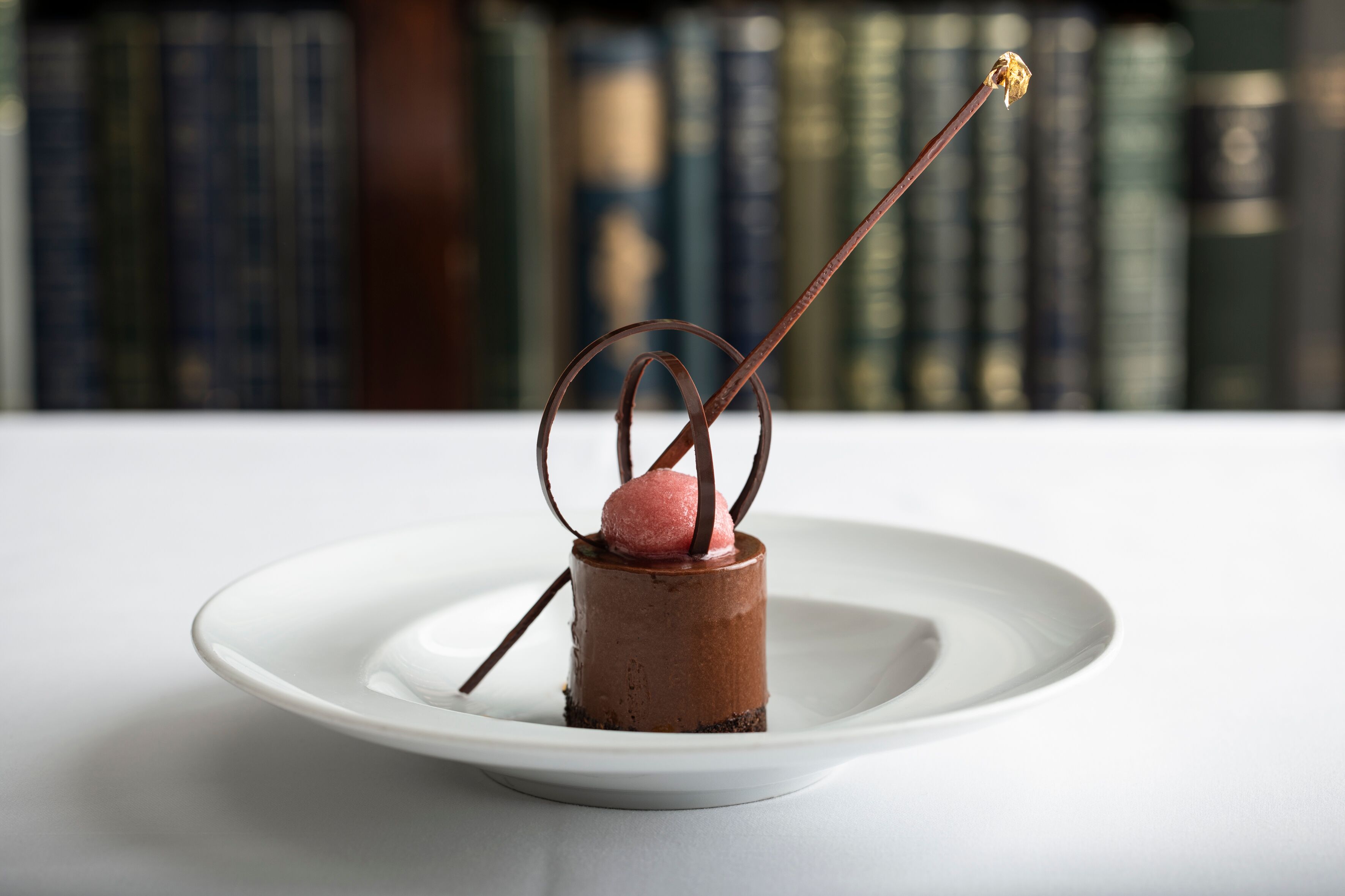 Elegant chocolate mousse dessert at Cinnamon Kitchen Battersea for gala dinners.