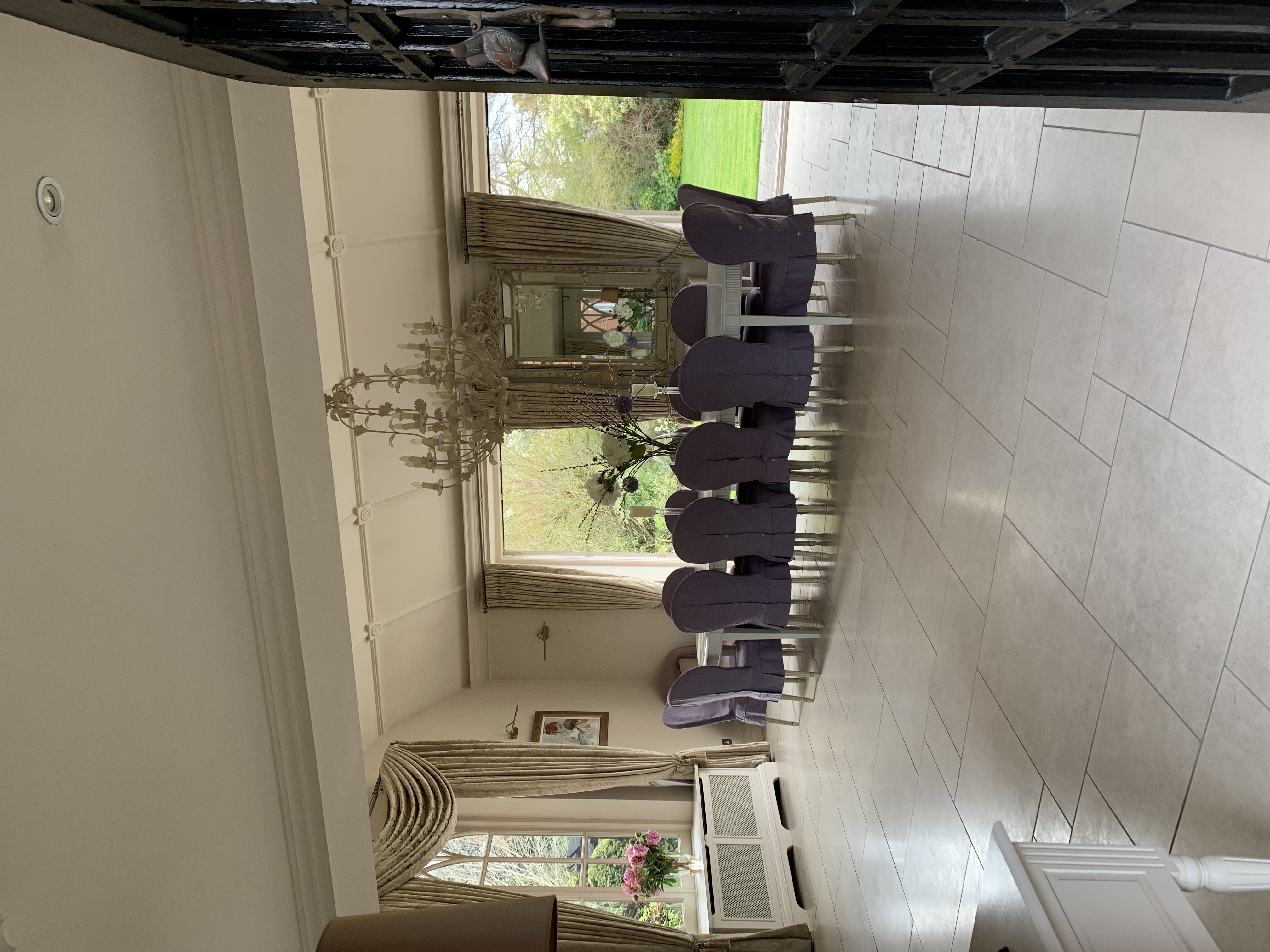 Elegant dining hall at Foxlea Manor with plush chairs, ideal for meetings and events.