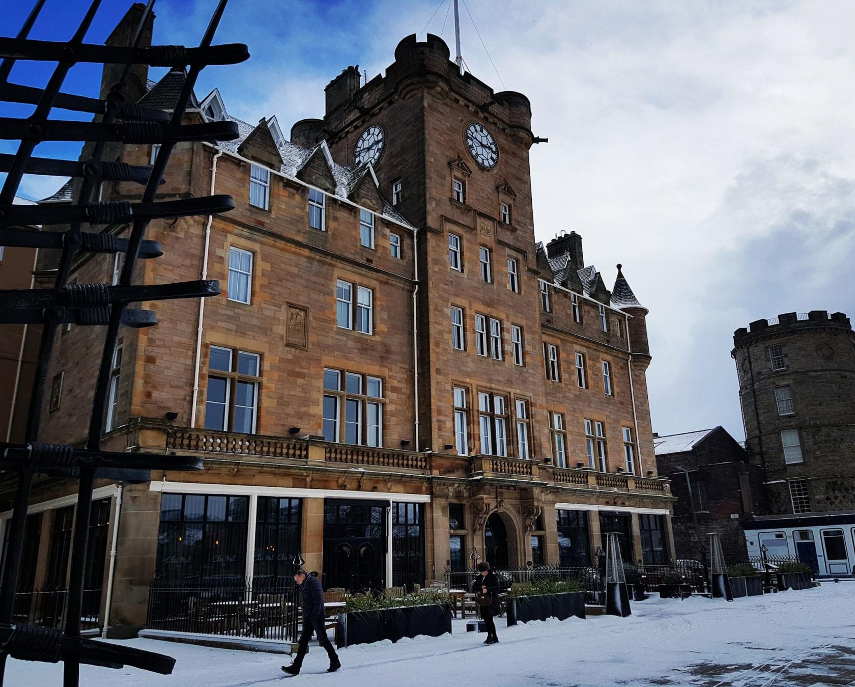 Historic Malmaison Edinburgh venue with clock tower, ideal for upscale events and receptions.
