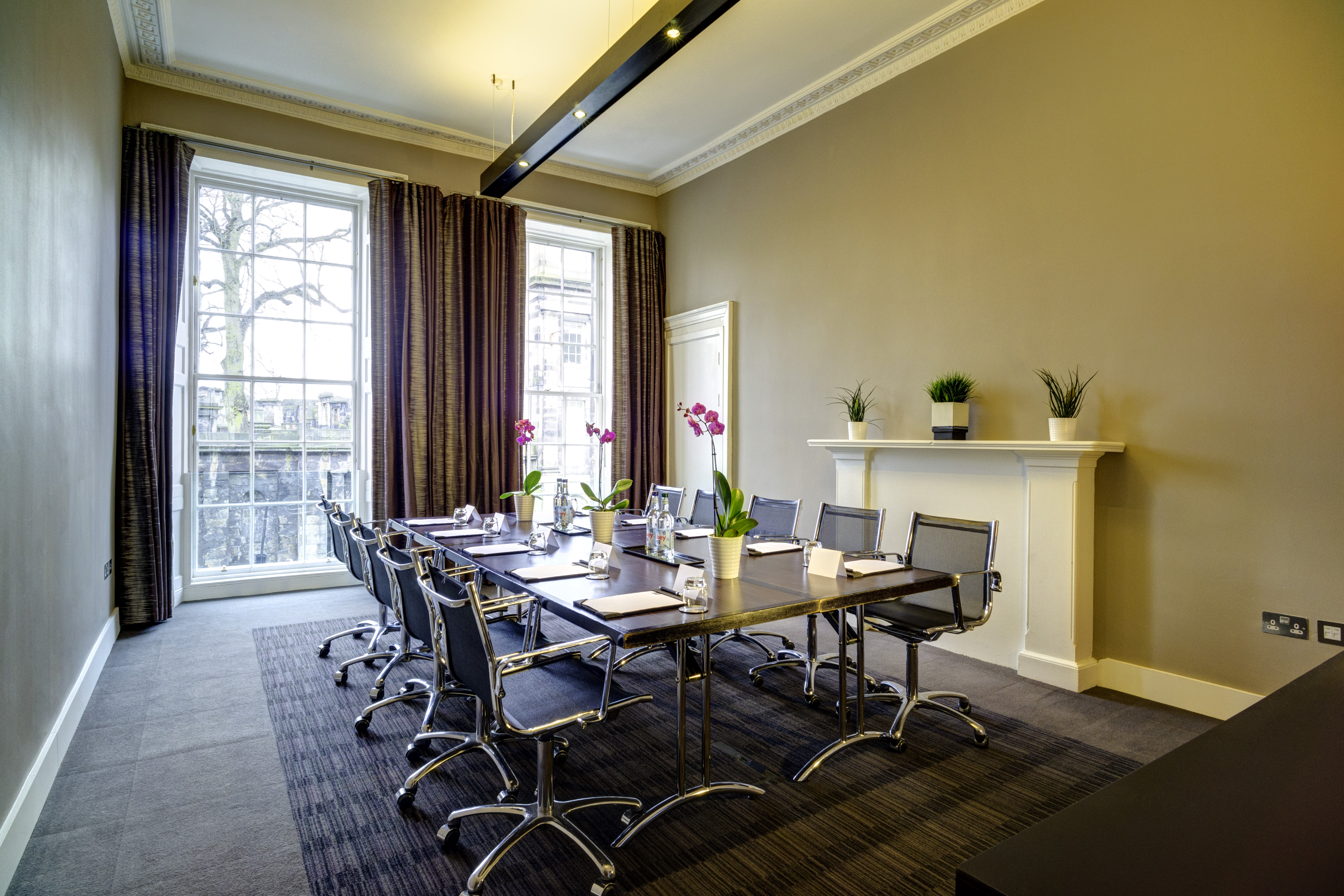 Waverley meeting room with sleek table and natural light for professional events.
