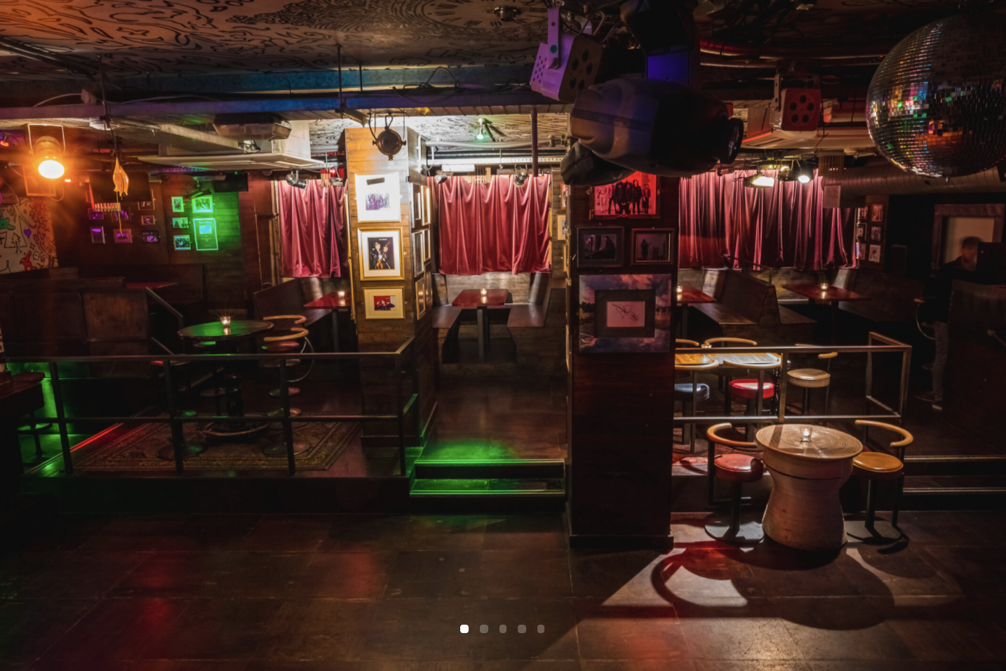 Hoxton Underbelly event space with cozy seating and vibrant lighting for parties and networking.