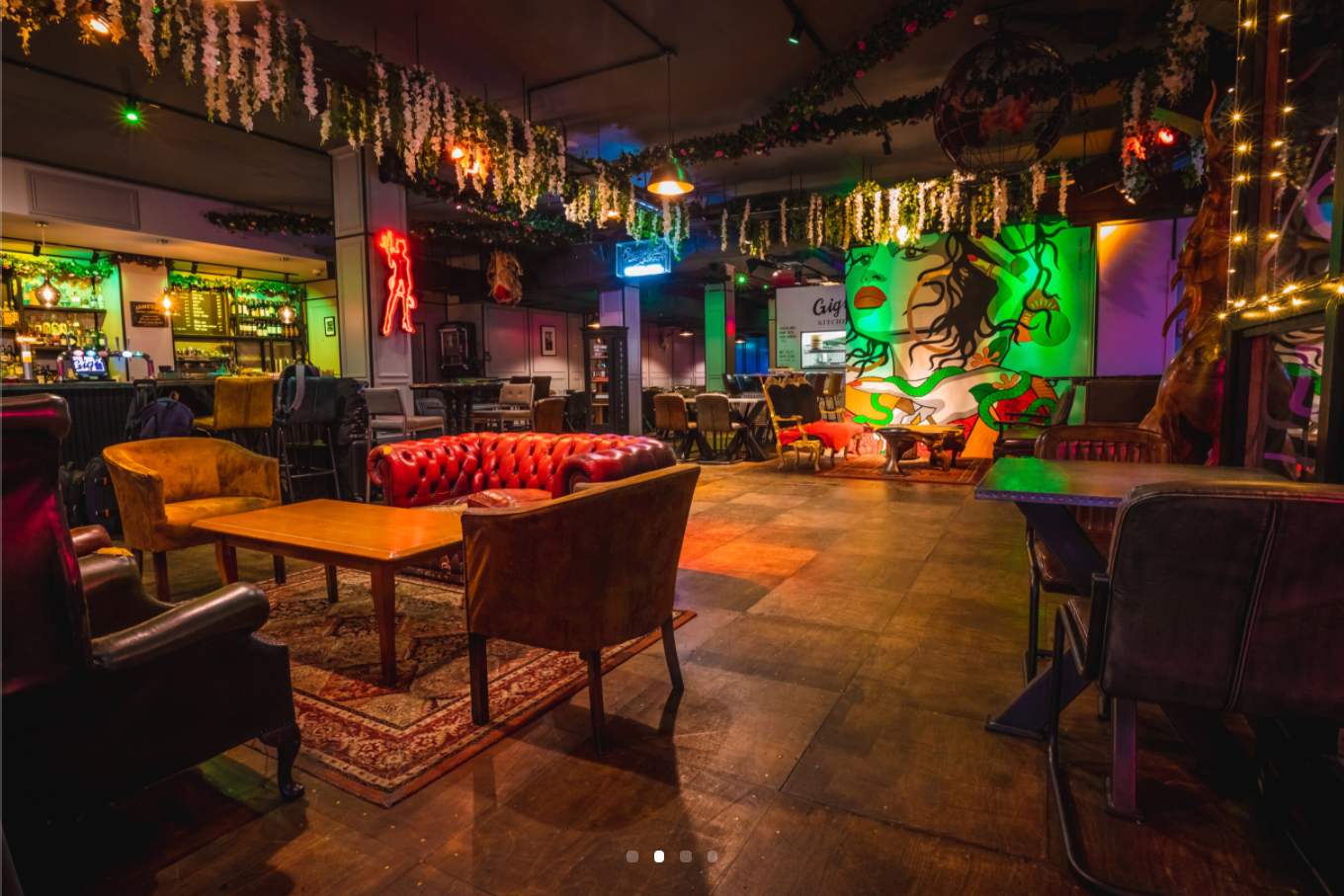 Vibrant Hoxton Underbelly event space with cozy seating for creative gatherings.