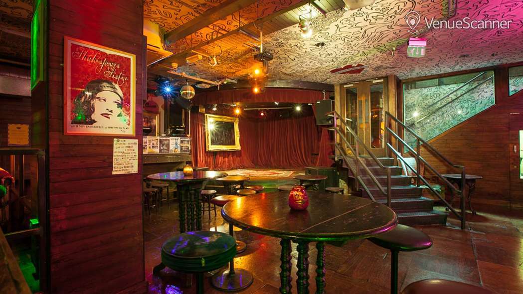 Hoxton Underbelly event space with cozy decor, perfect for gatherings and performances.
