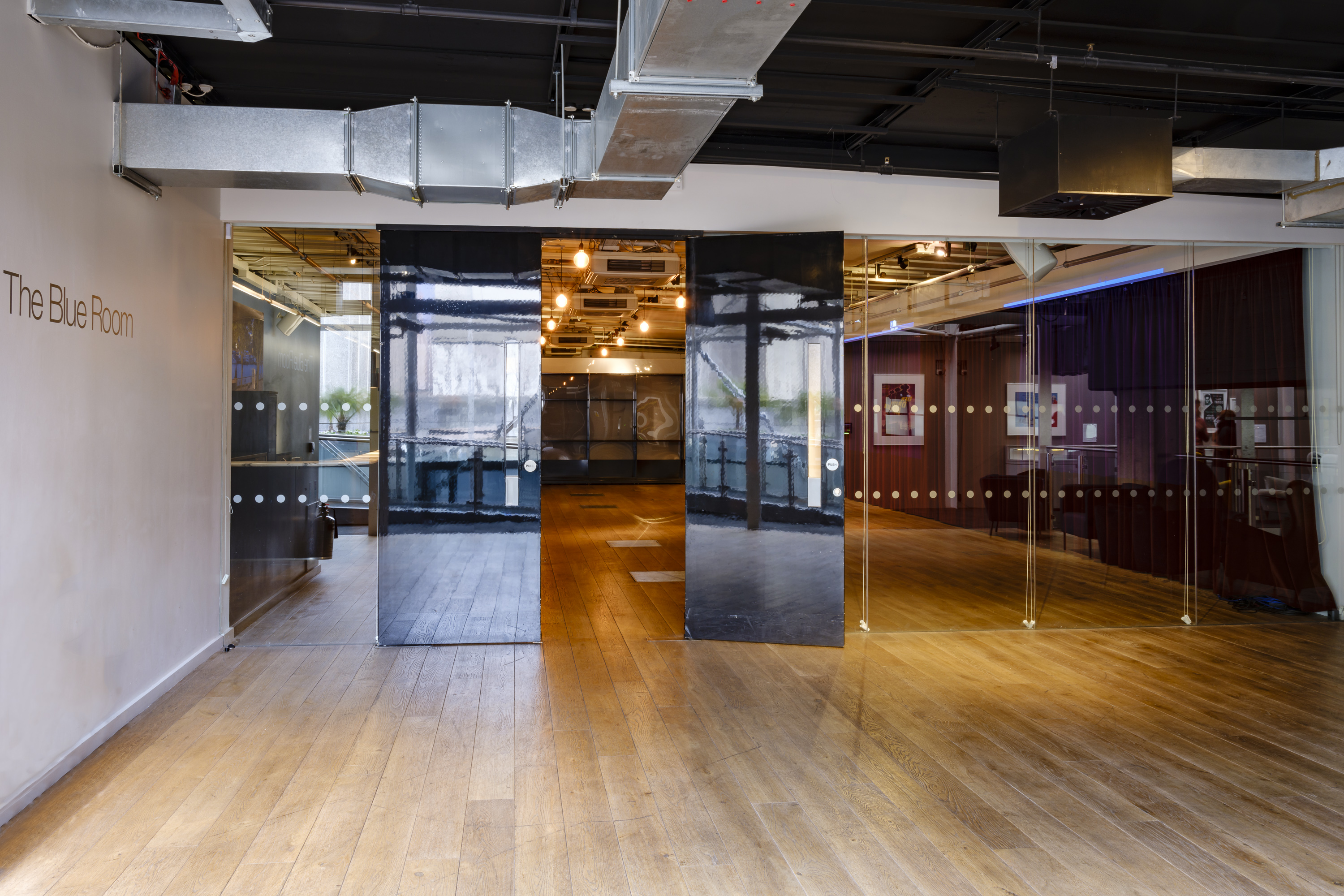 Blue Room at BFI Southbank: modern event space with glass partitions for meetings and gatherings.