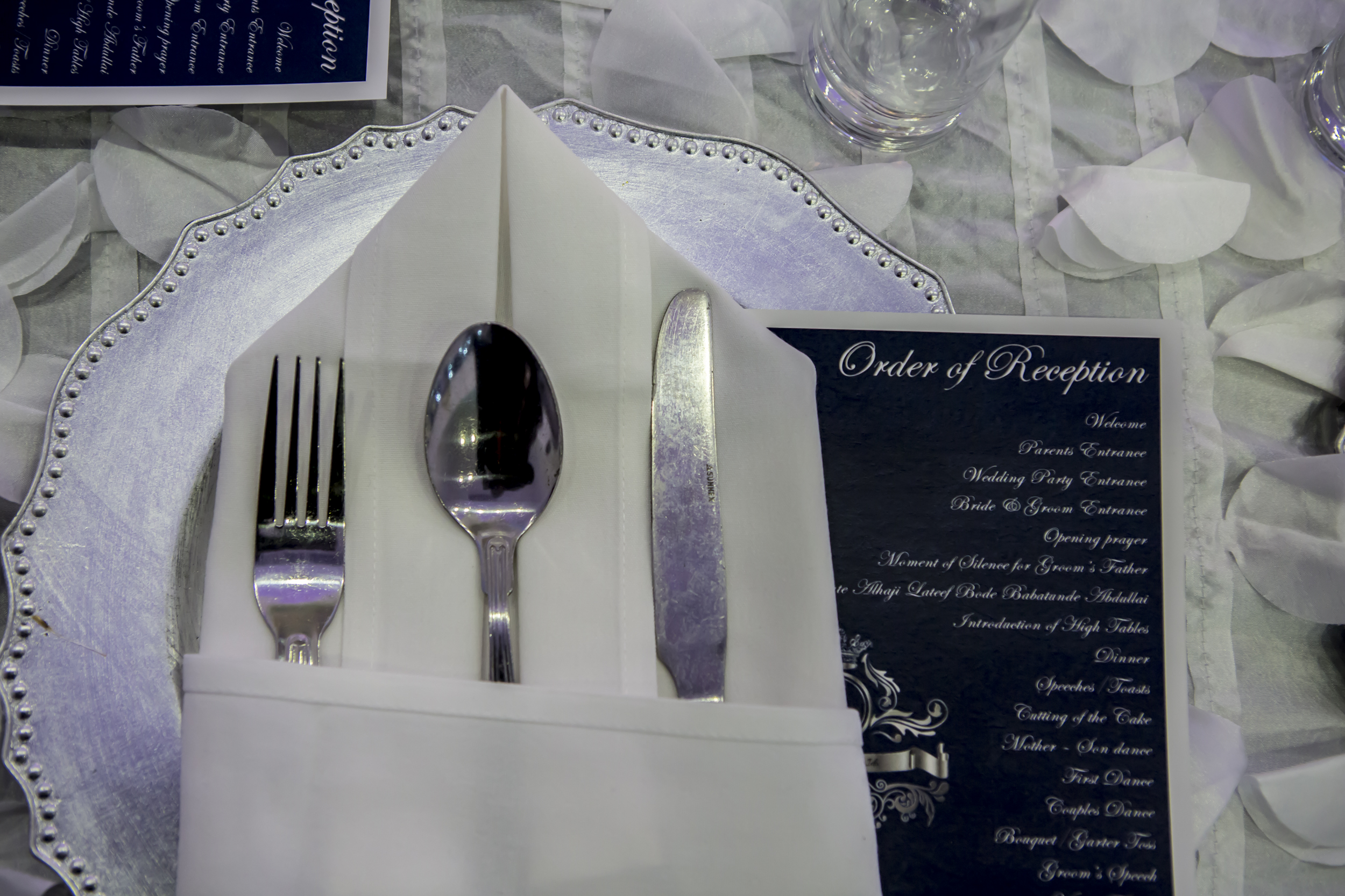 Elegant dining table setup in The Mayfair Grand Ballroom for a reception event.