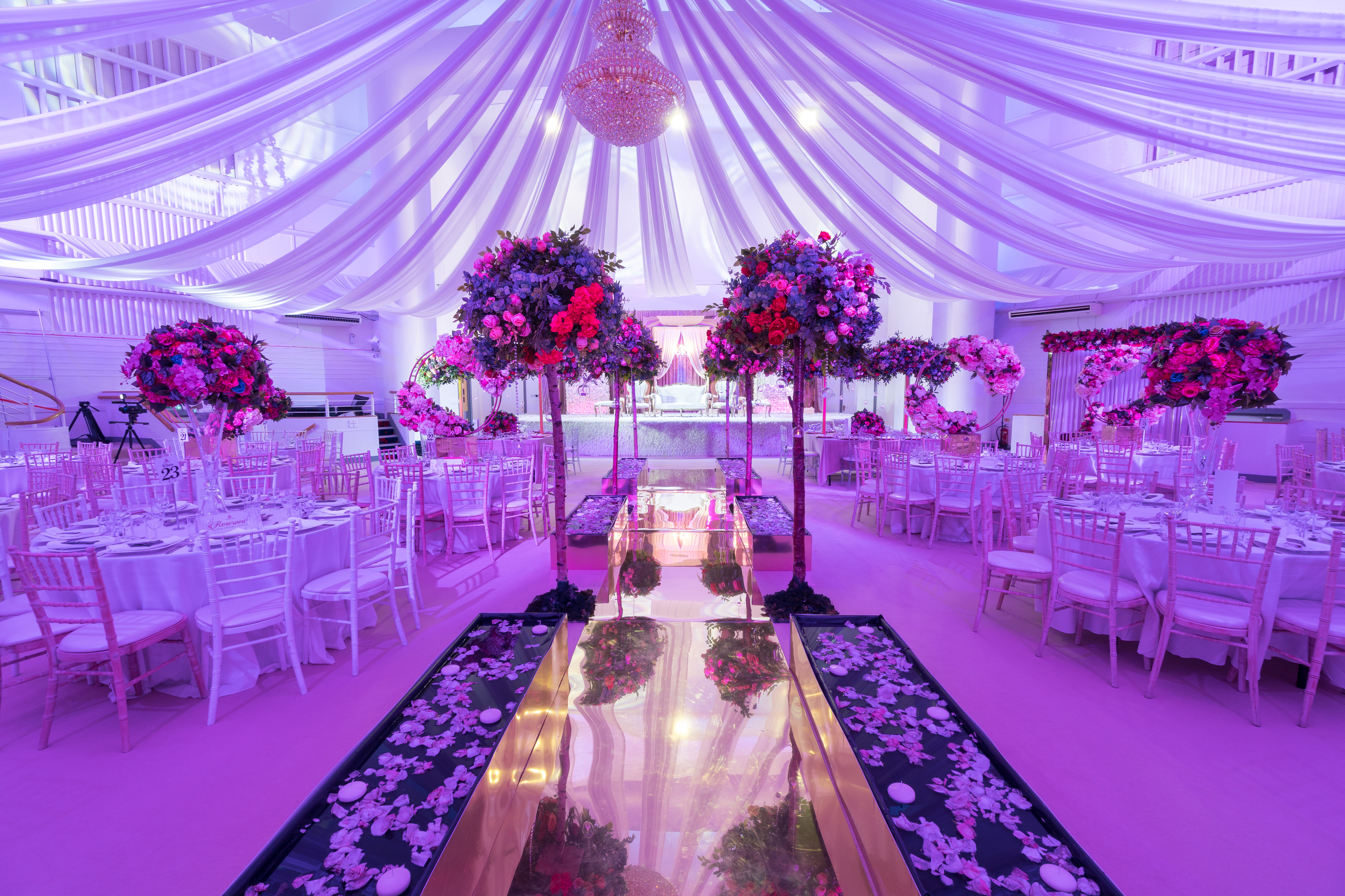 Elegant Grand Ballroom at The Mayfair with draped ceiling, ideal for weddings and upscale events.