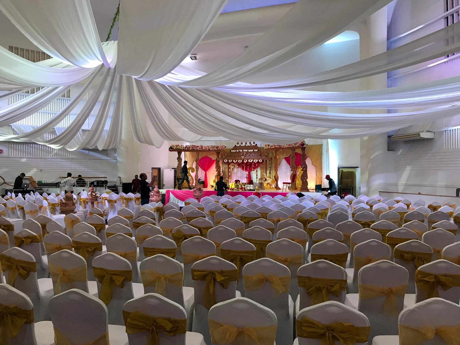 Grand Ballroom at The Mayfair with elegant drapery, ideal for formal celebrations and ceremonies.