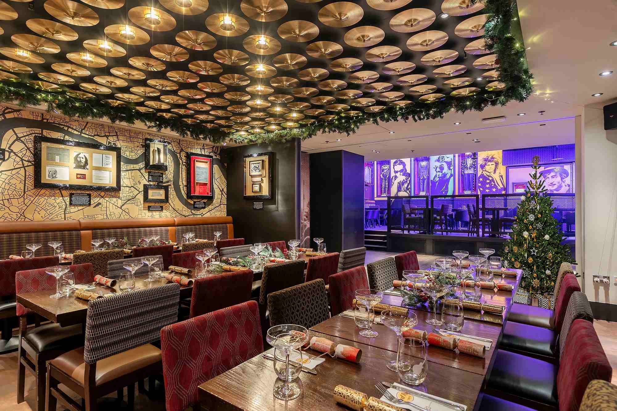 Full Venue Hire at Hard Rock Cafe Piccadilly Circus, stylish dining area for holiday events.