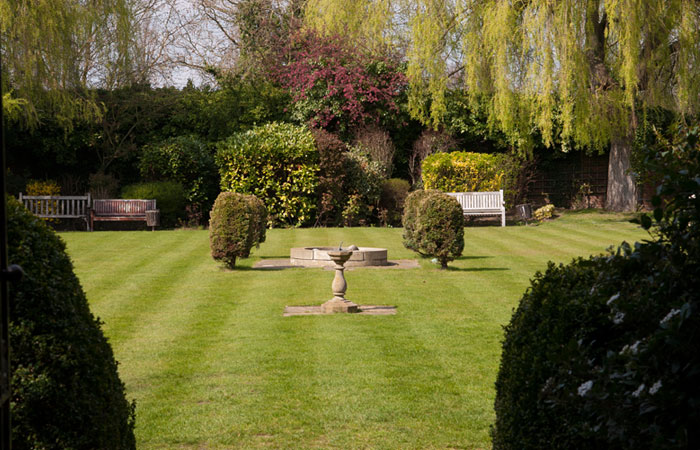 Mega Marquee garden with lush greenery, ideal for weddings and corporate events.