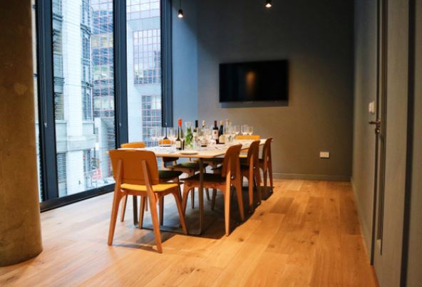 Modern meeting space at Leman Locke with elegant table setup for corporate events.