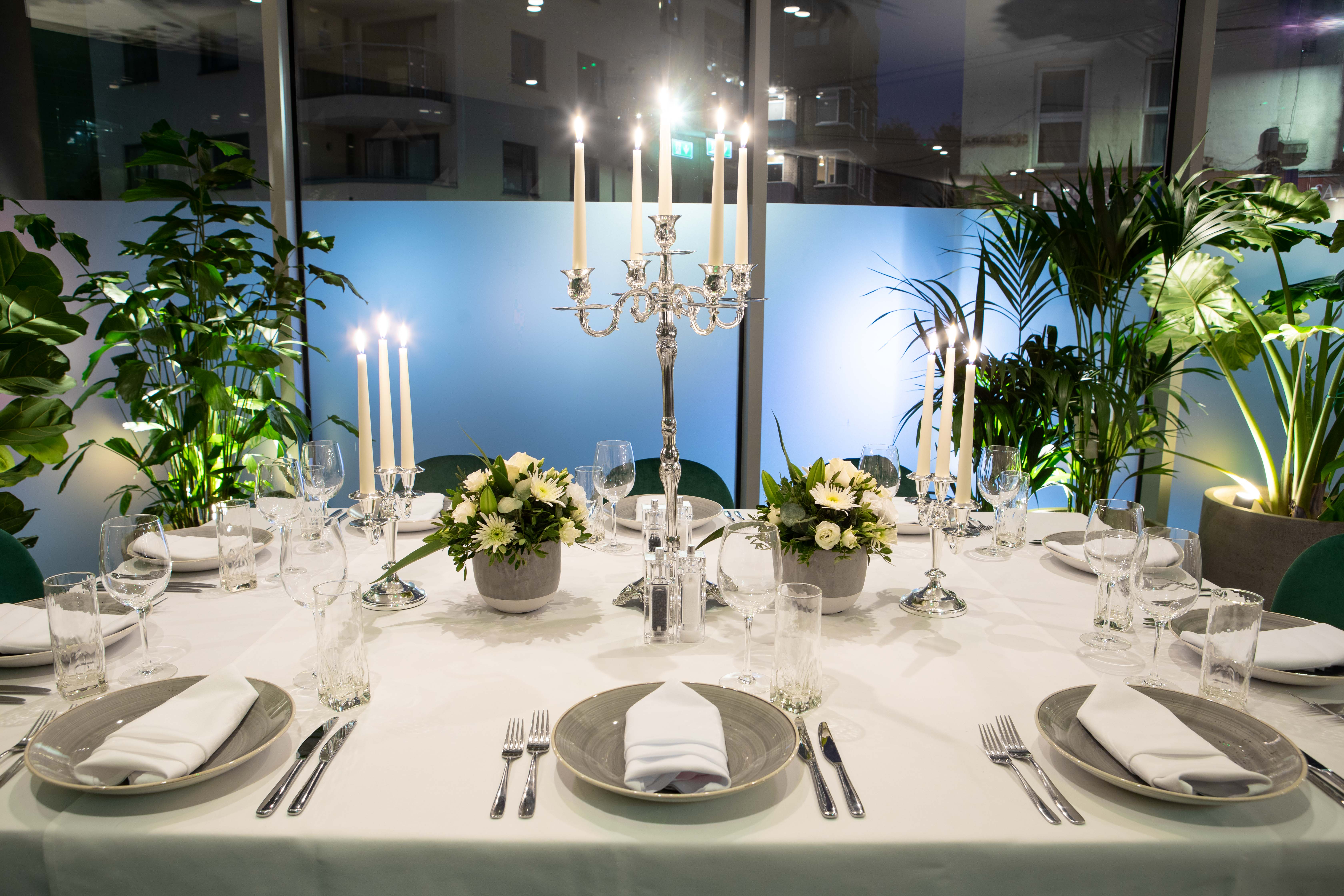 Elegant dining table in Green Room, Holiday Inn London Whitechapel for upscale events.