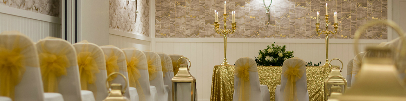 Elegant event space in Bristol Harbour Hotel with gold accents, perfect for weddings.