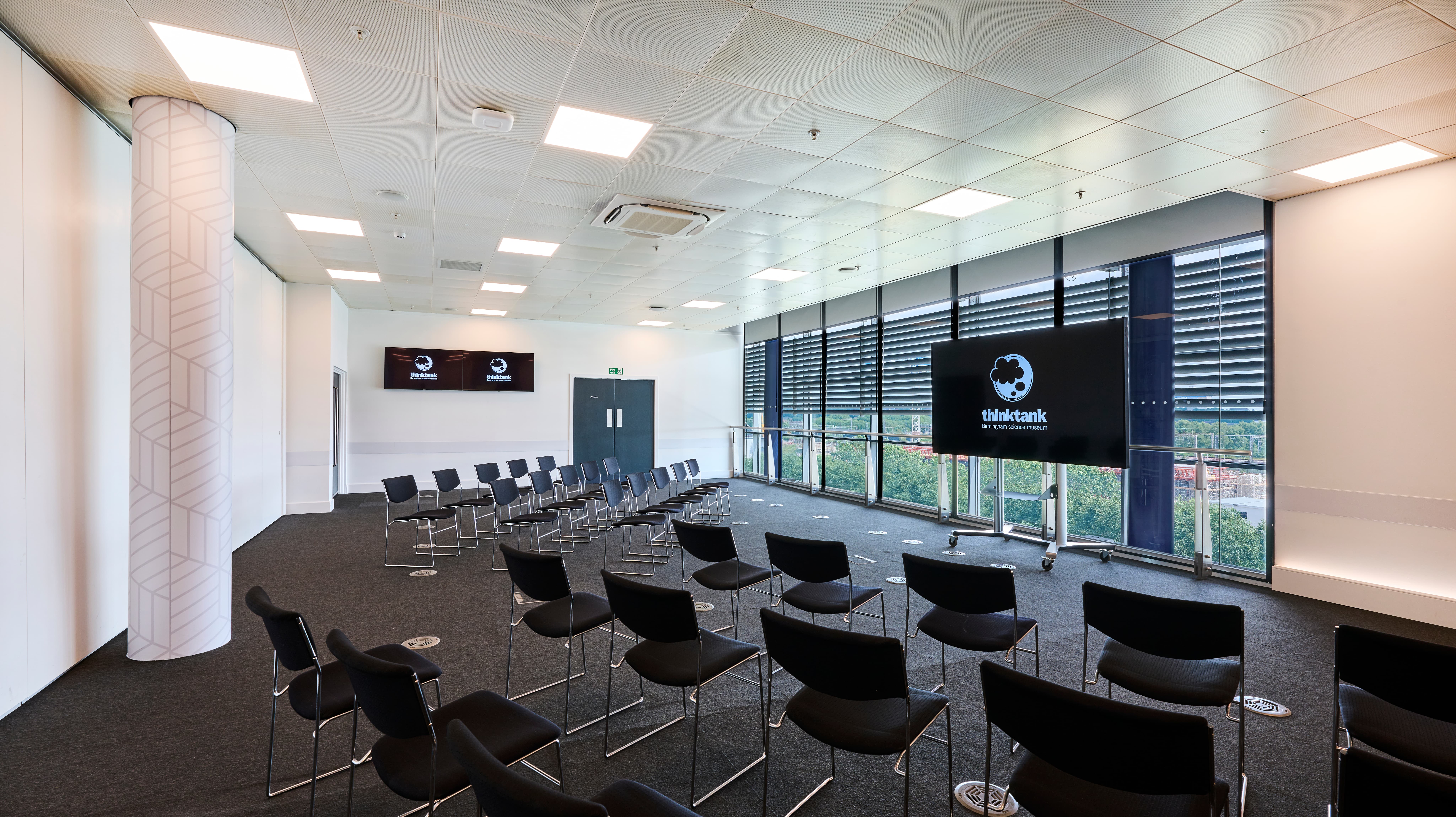 Thinktank Event Suite conference room with floor-to-ceiling windows for meetings and workshops.