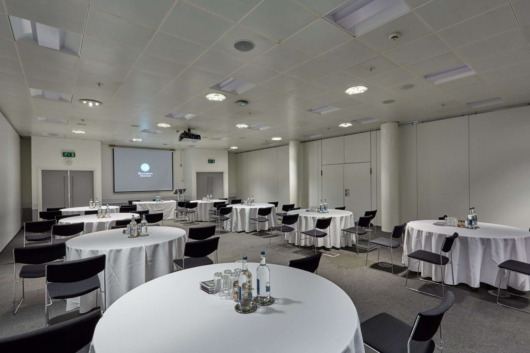 Event Suite at Thinktank: modern meeting space with round tables for corporate workshops.