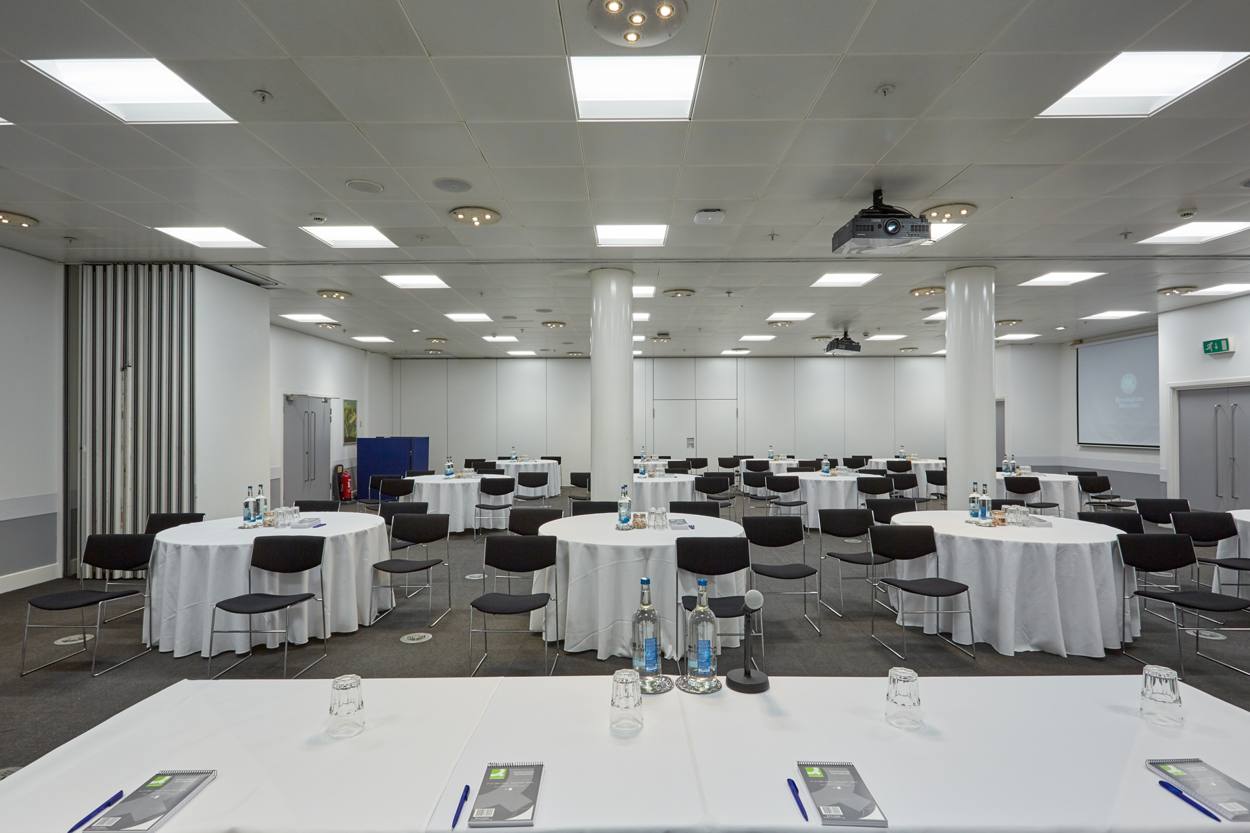 Event Suite at Thinktank: versatile meeting space with round tables for workshops and presentations.