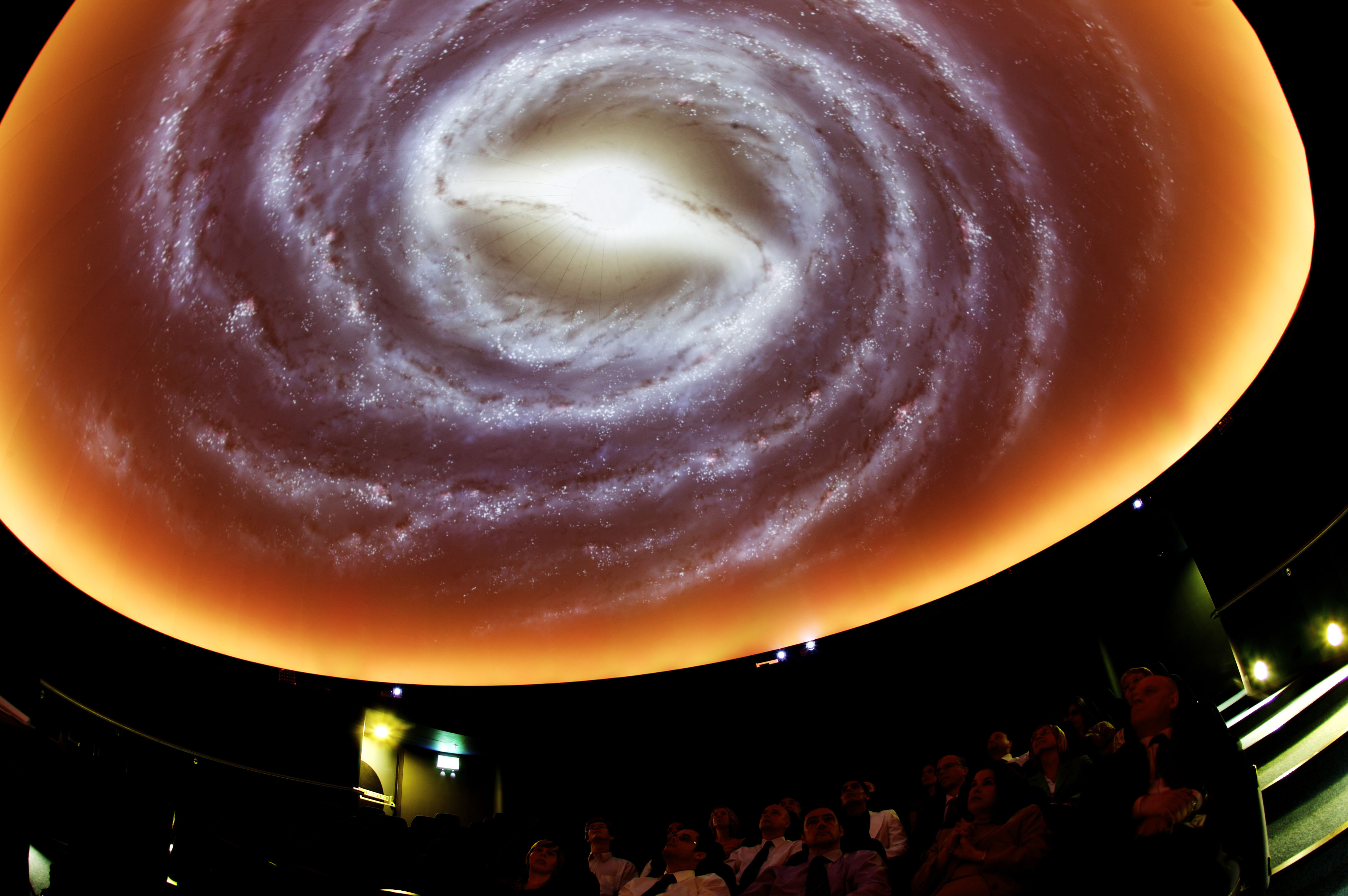 Planetarium in Thinktank with spiral galaxy ceiling for immersive events and presentations.