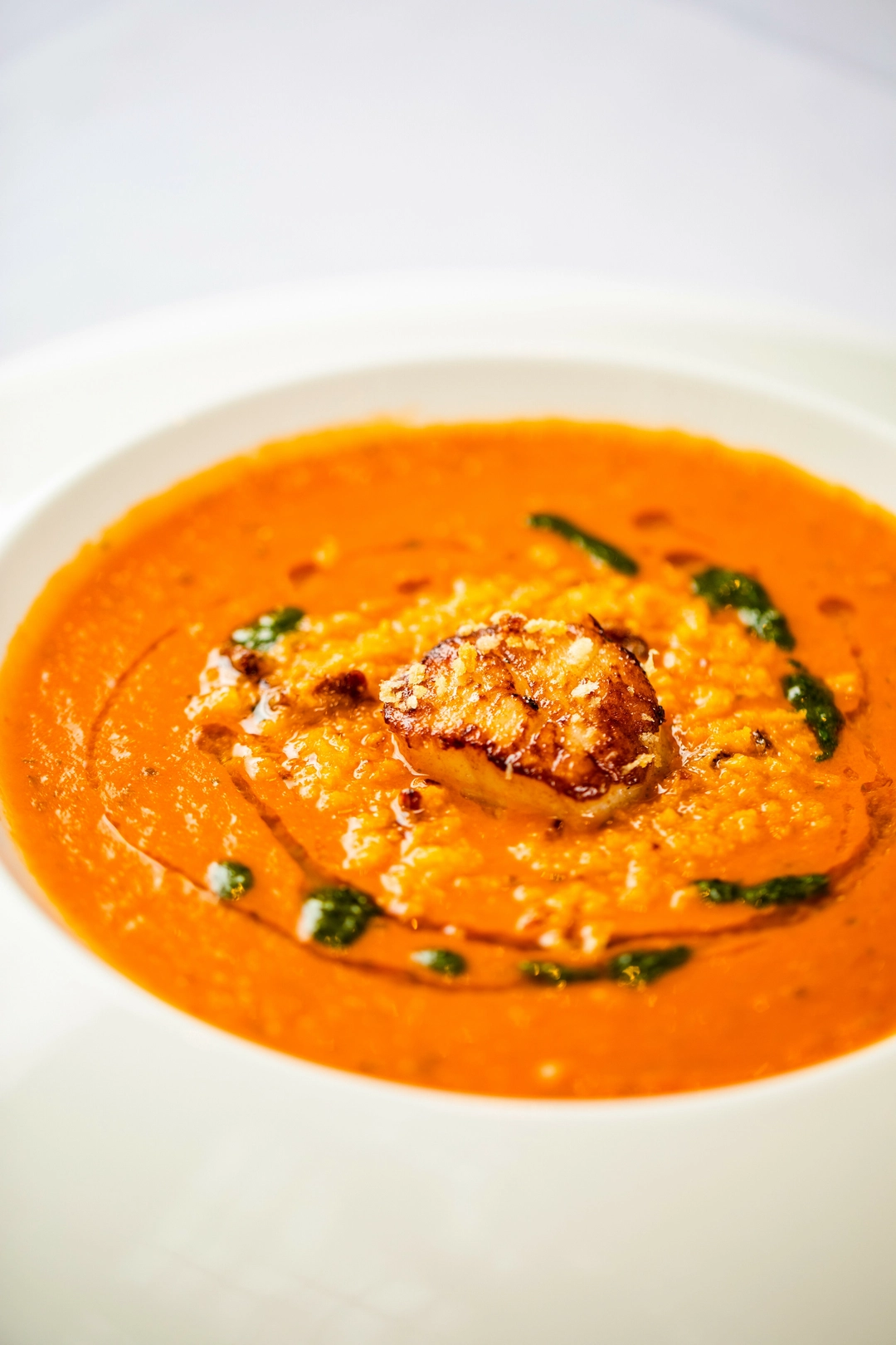 Plated fish dish with orange sauce at Birmingham Museum event catering.