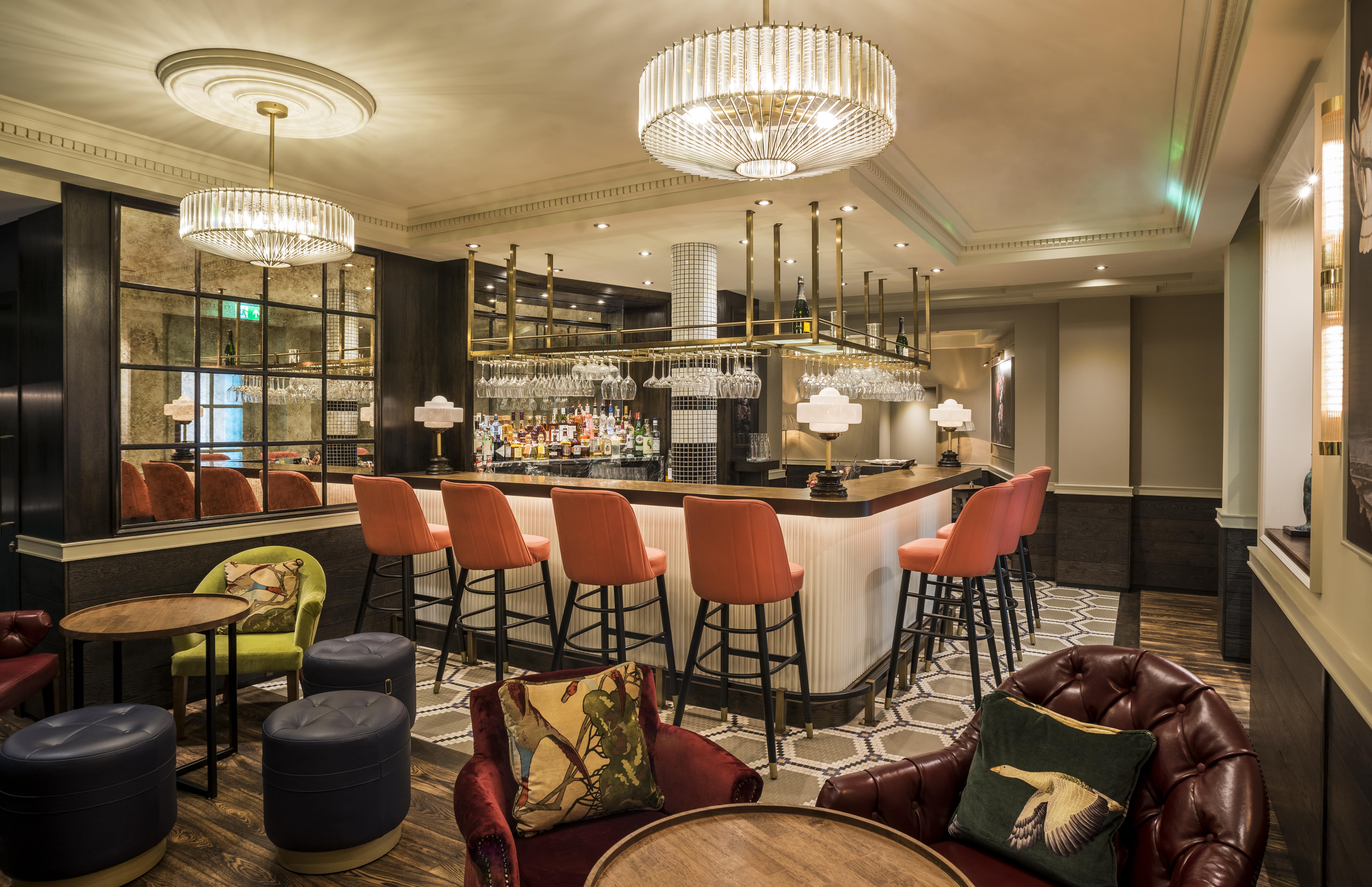 Stylish Sloane Place Bar with plush seating, ideal for networking events and gatherings.