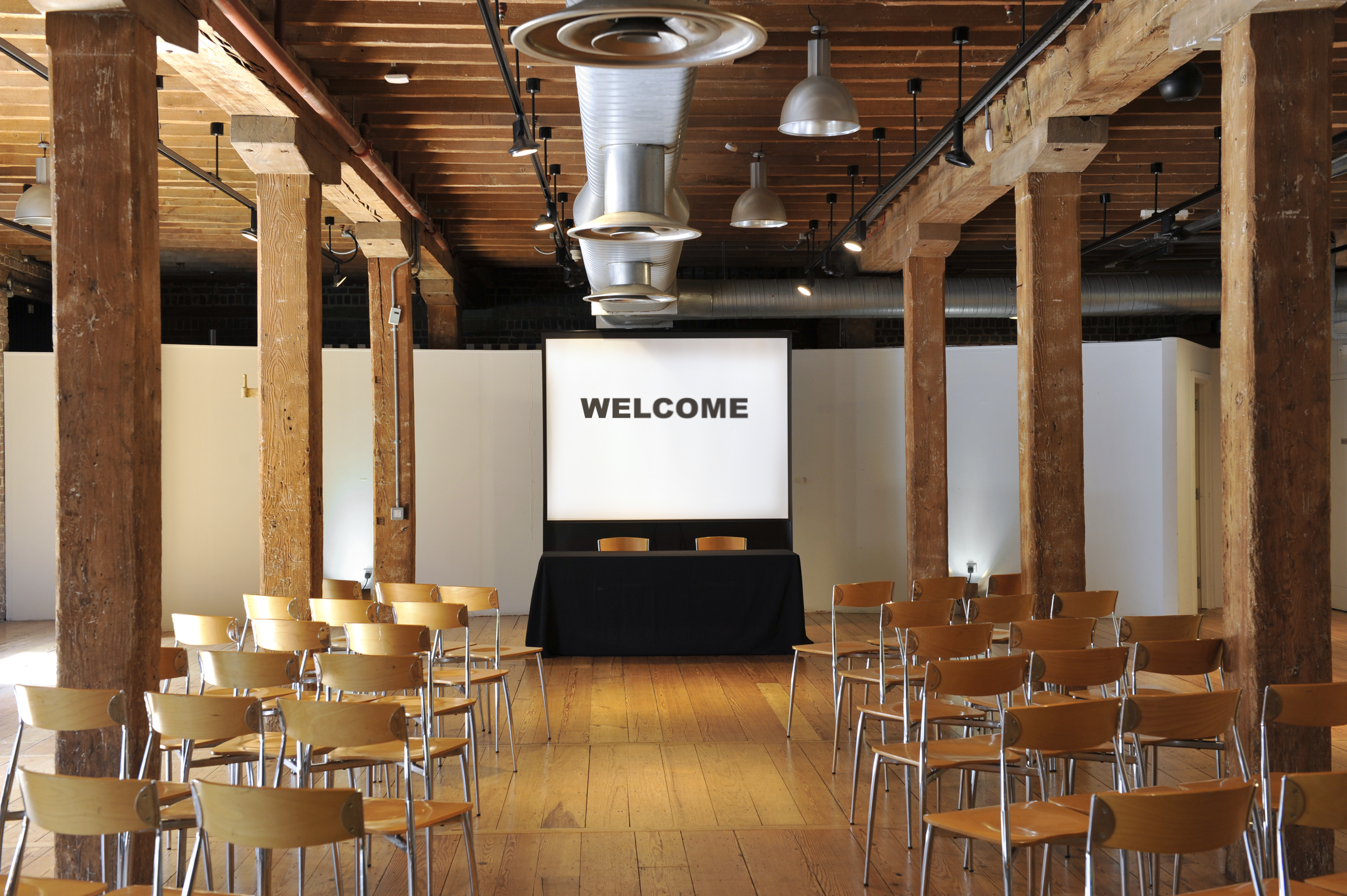 Event space at Rum Store, London Docklands, with welcoming setup for presentations.