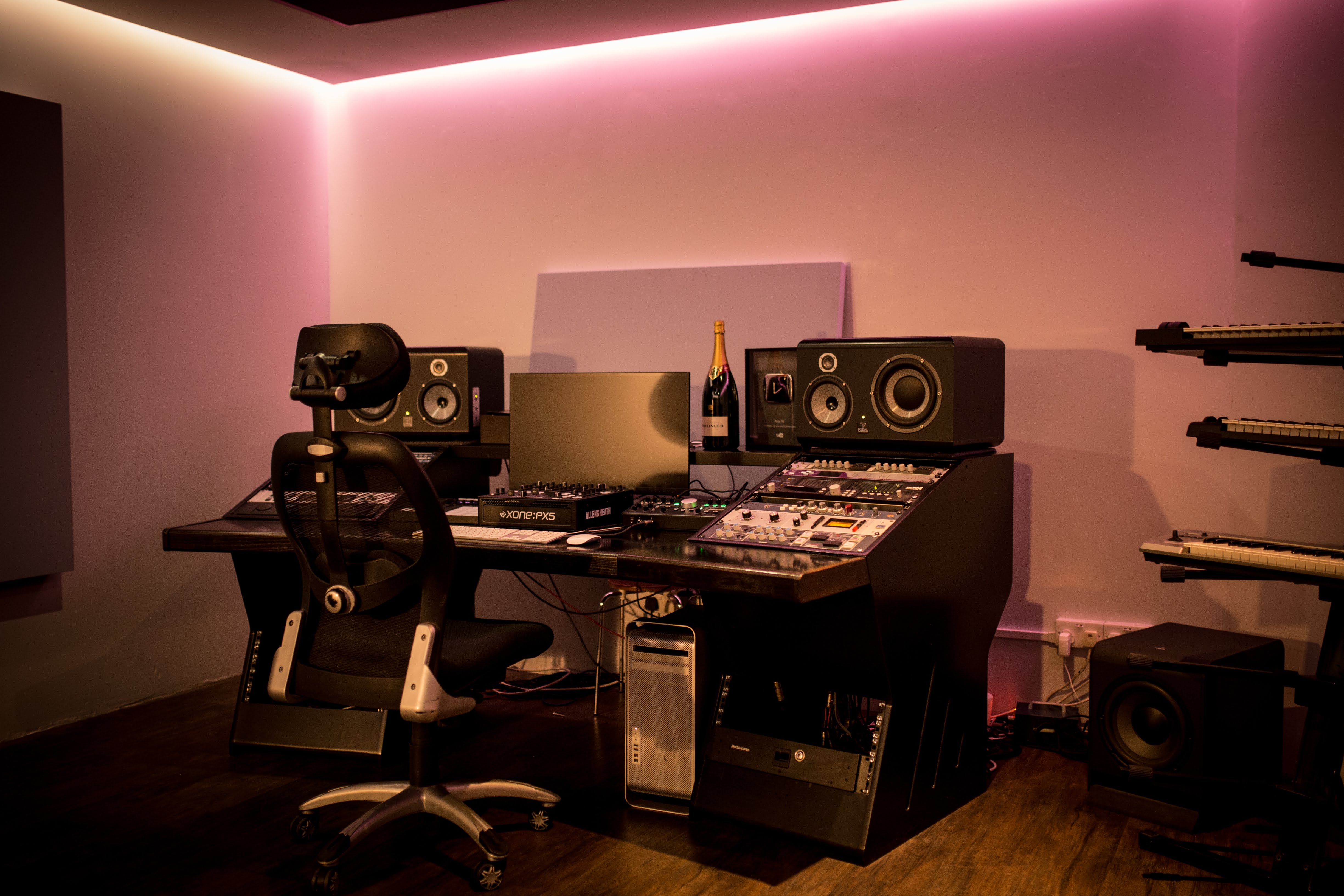 Modern Rinse FM studio with ambient lighting for creative workshops and music events.