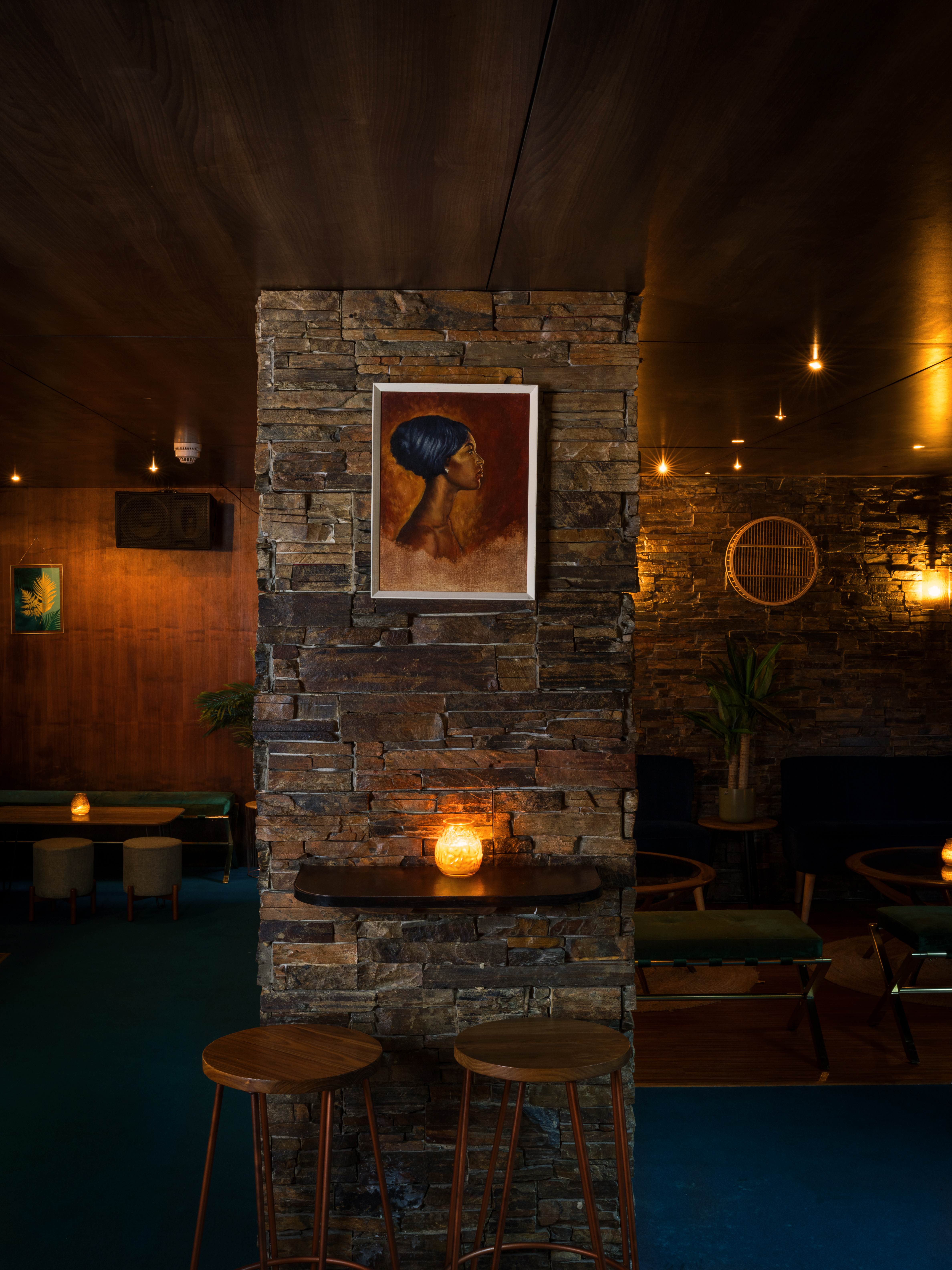 Stylish venue with stone walls, ideal for intimate gatherings and networking events.