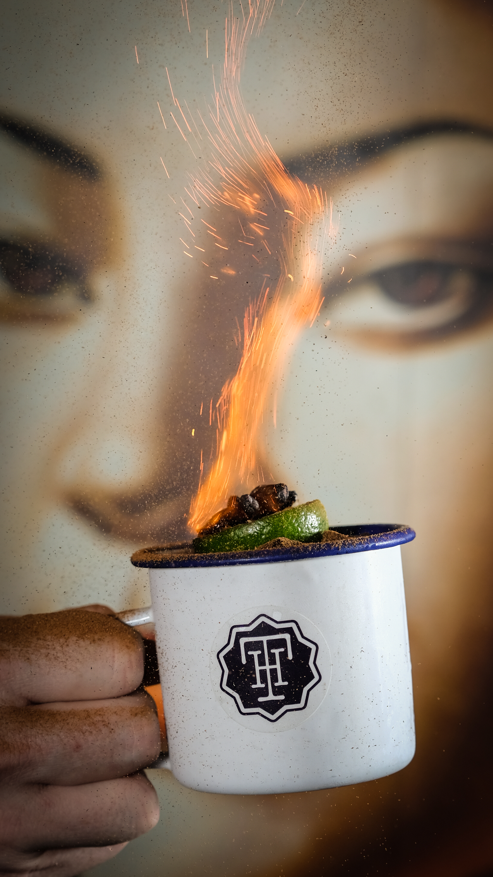 Vibrant culinary presentation with flames at Trailer Happiness event experience.