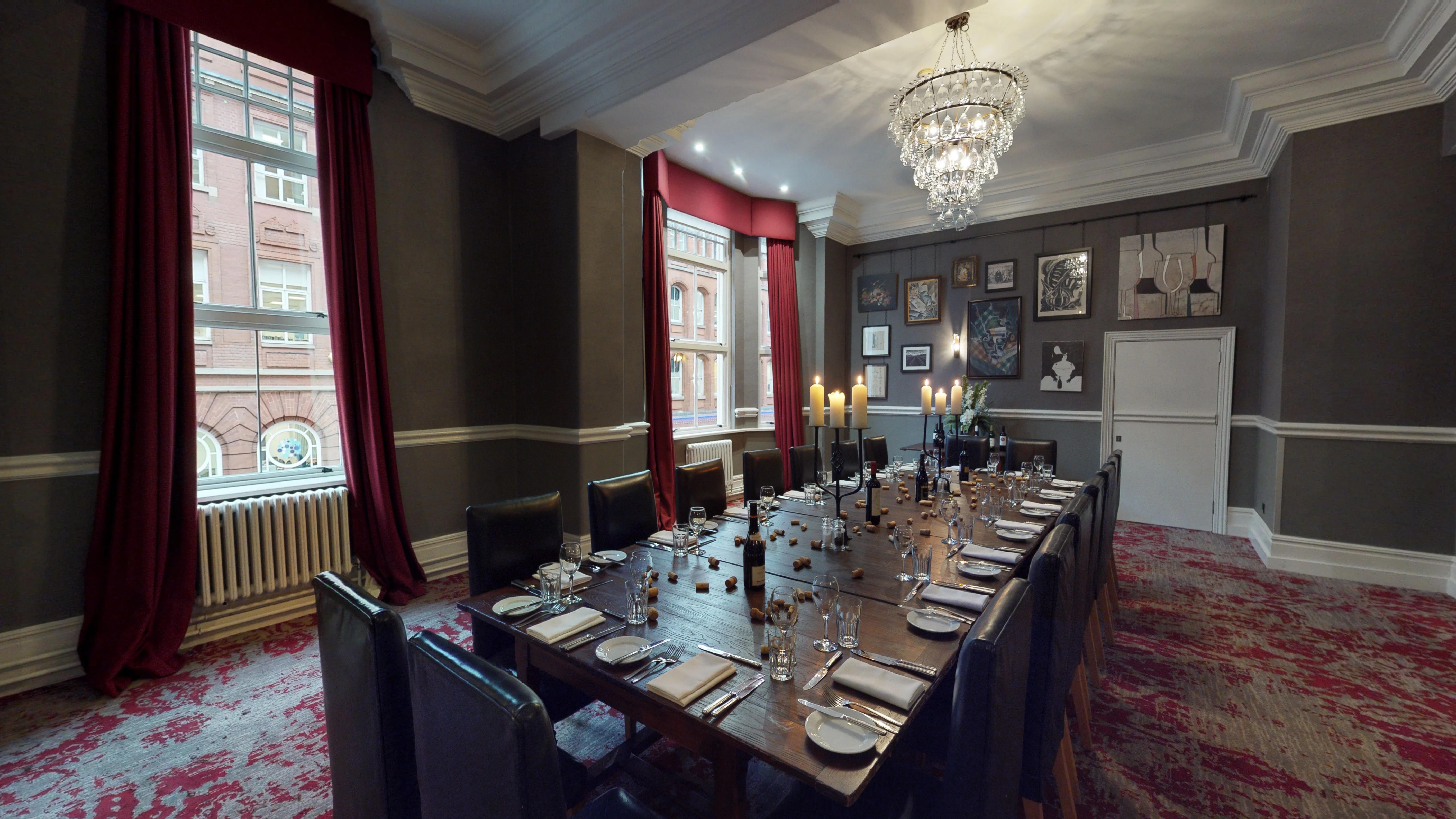Elegant meeting space at Hotel du Vin Birmingham with wooden table, ideal for corporate events.