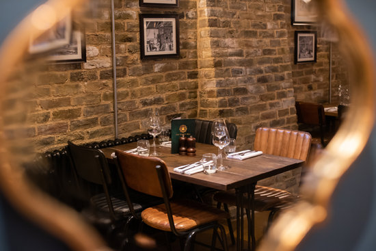 Cozy dining setup in Trinity Bell Room, ideal for intimate meetings and private dinners.