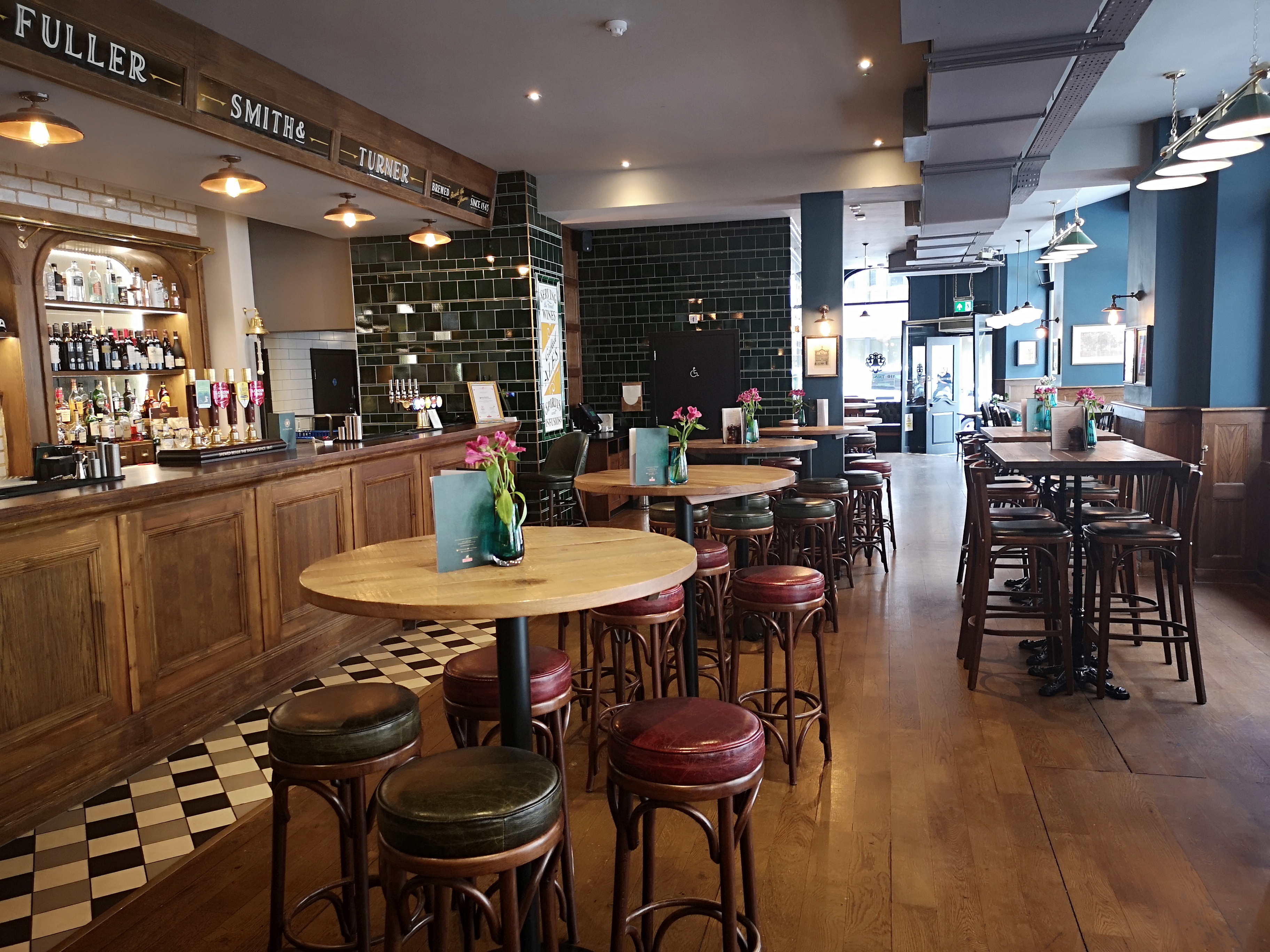 Main Bar at The Trinity Bell: versatile event space with rustic decor for receptions and meetings.