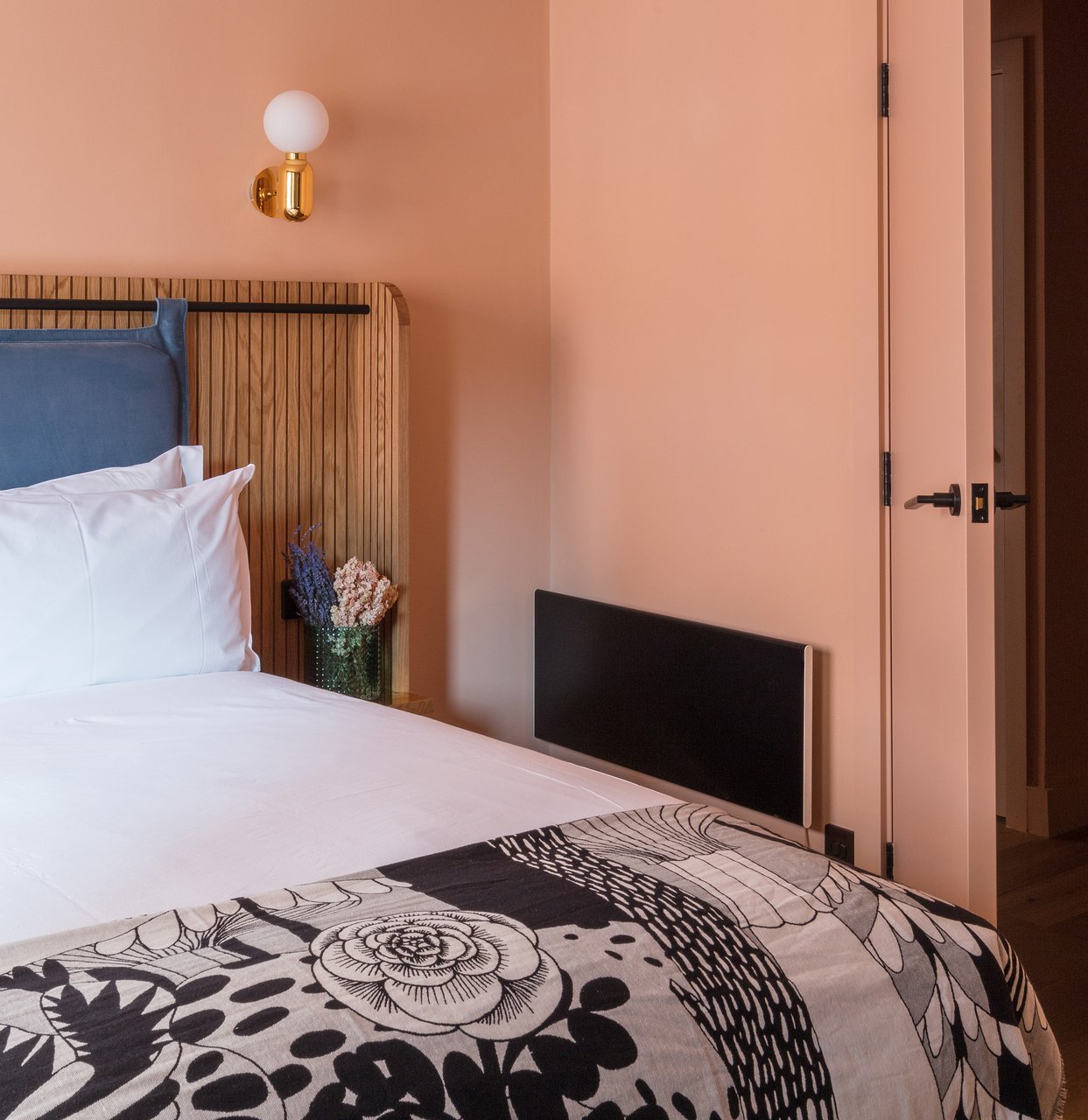 Modern hotel room at The Storehouse, ideal for retreats and small meetings.