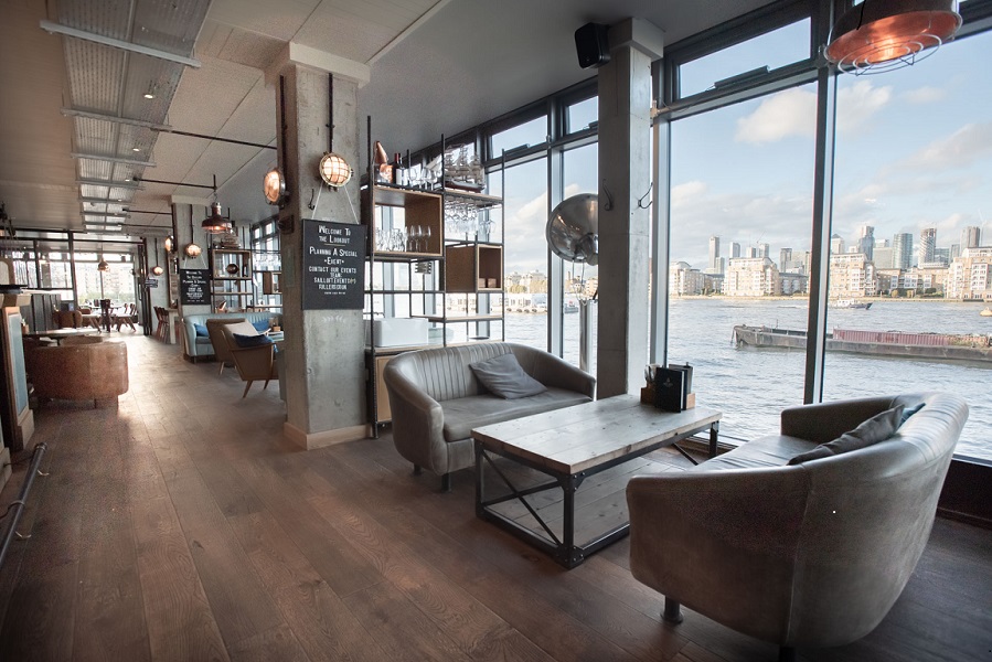 Stylish Upperdeck venue with waterfront view, perfect for meetings and events.