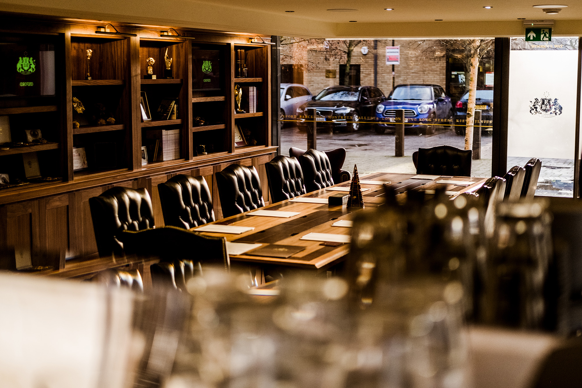 Sophisticated meeting room with wooden table and leather chairs in Central Oxford.
