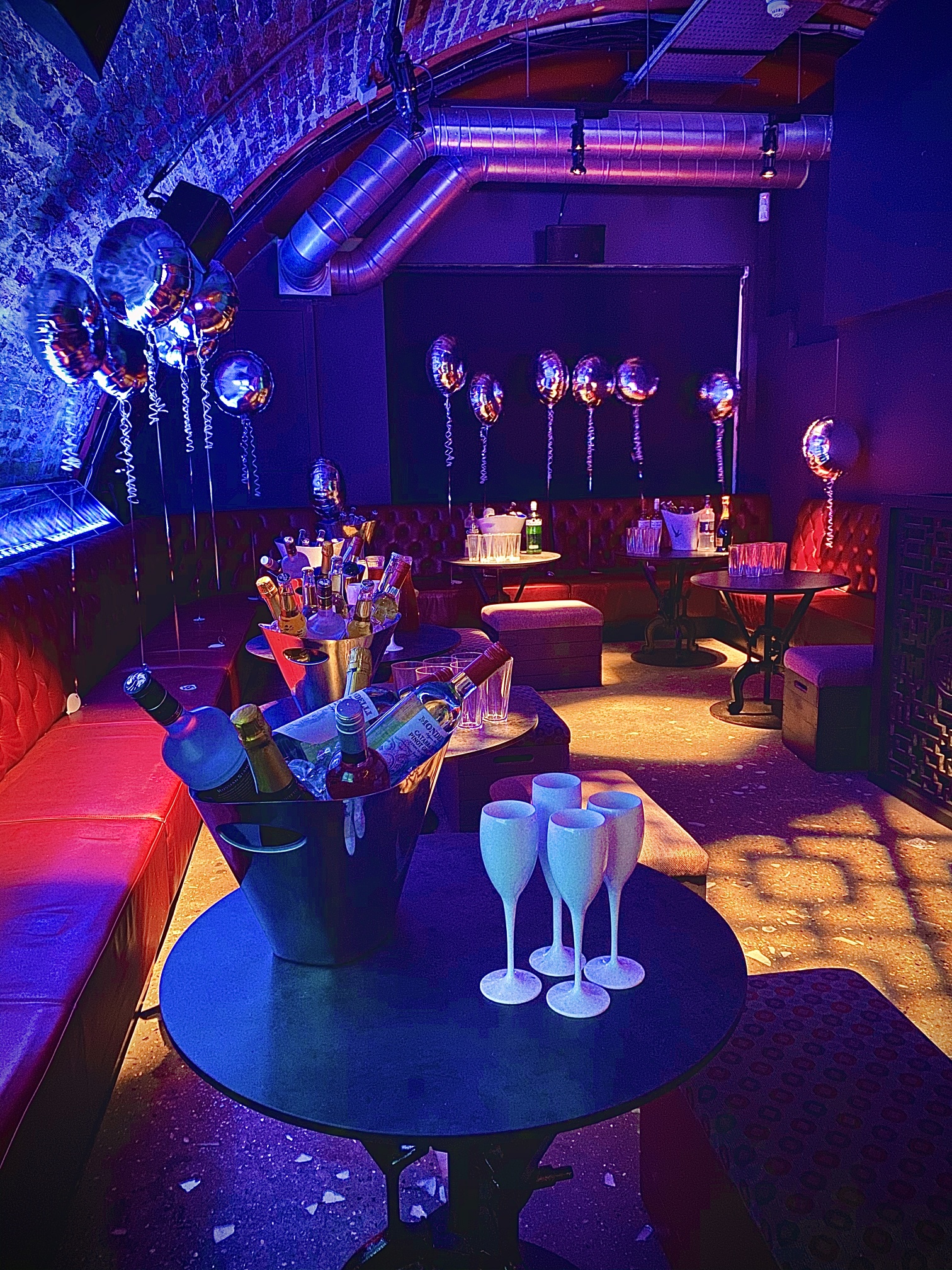 Vibrant event space with stylish seating for celebrations and parties.