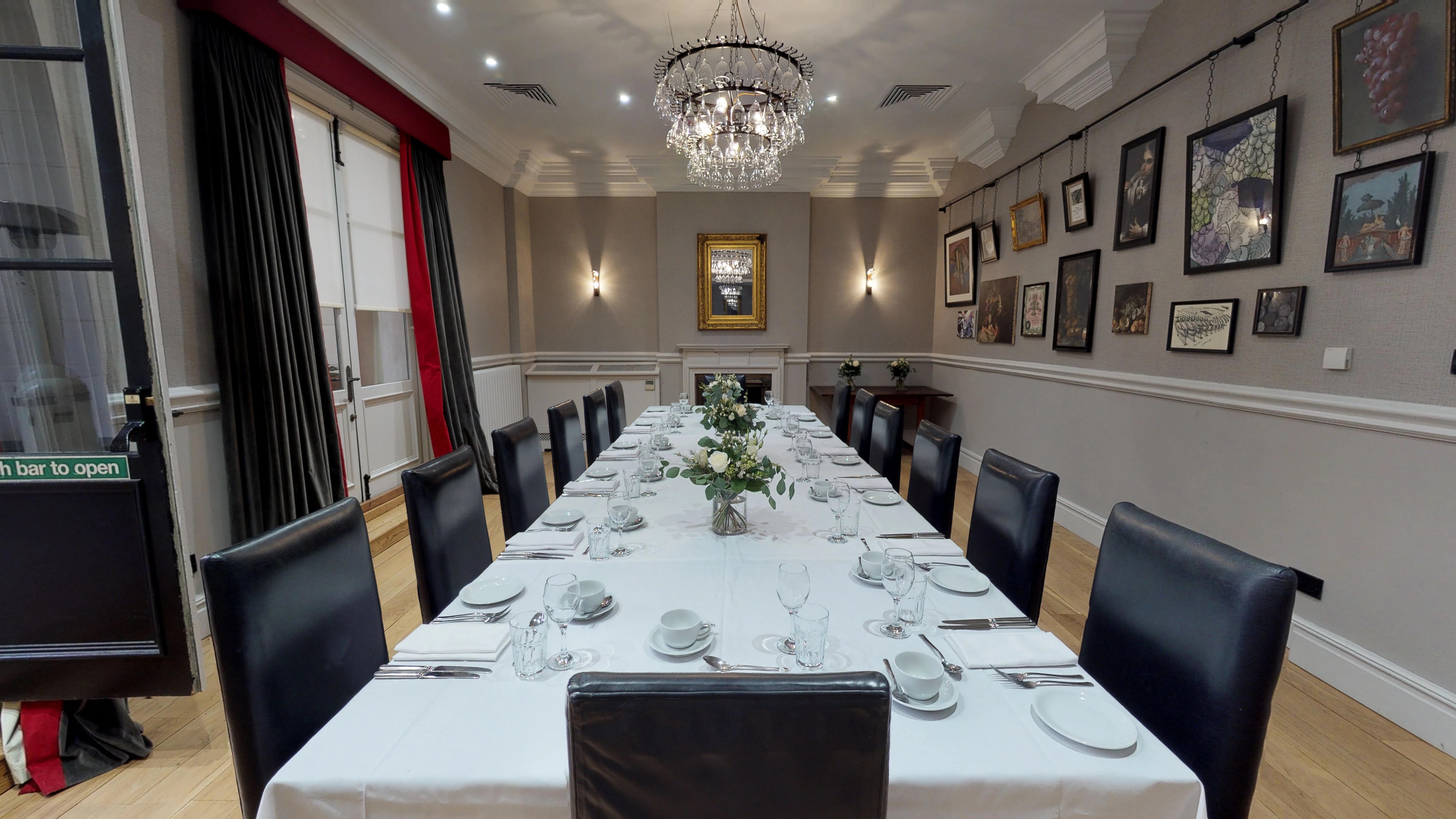 Sassicaia meeting room at Hotel du Vin, elegant table setup for corporate events.