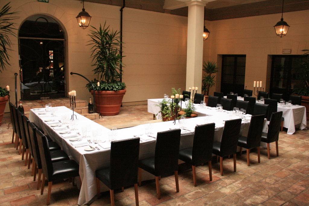 Elegant U-shaped dining setup in Hotel du Vin Birmingham for corporate dinners.