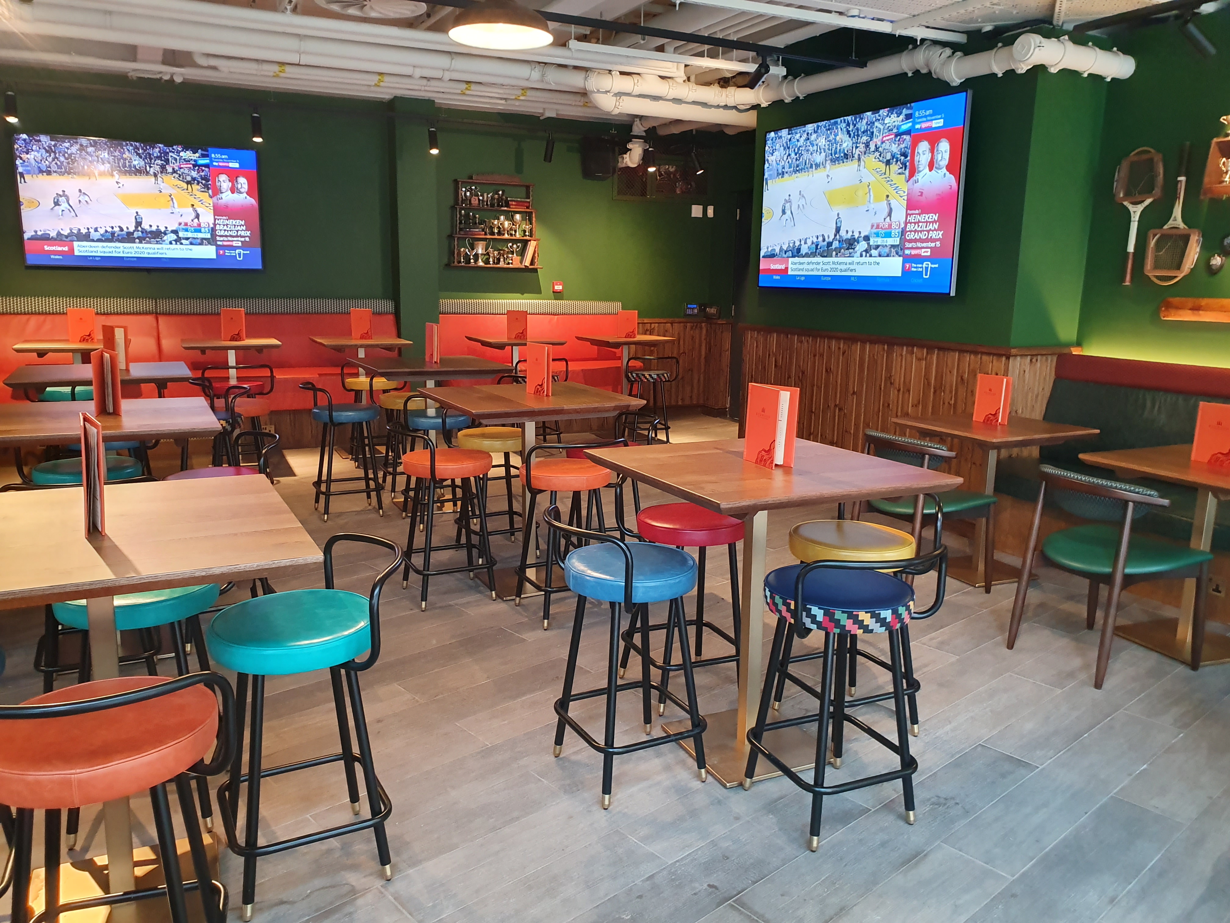 Vibrant event space at Redwood Sports Pub for watch parties and networking events.
