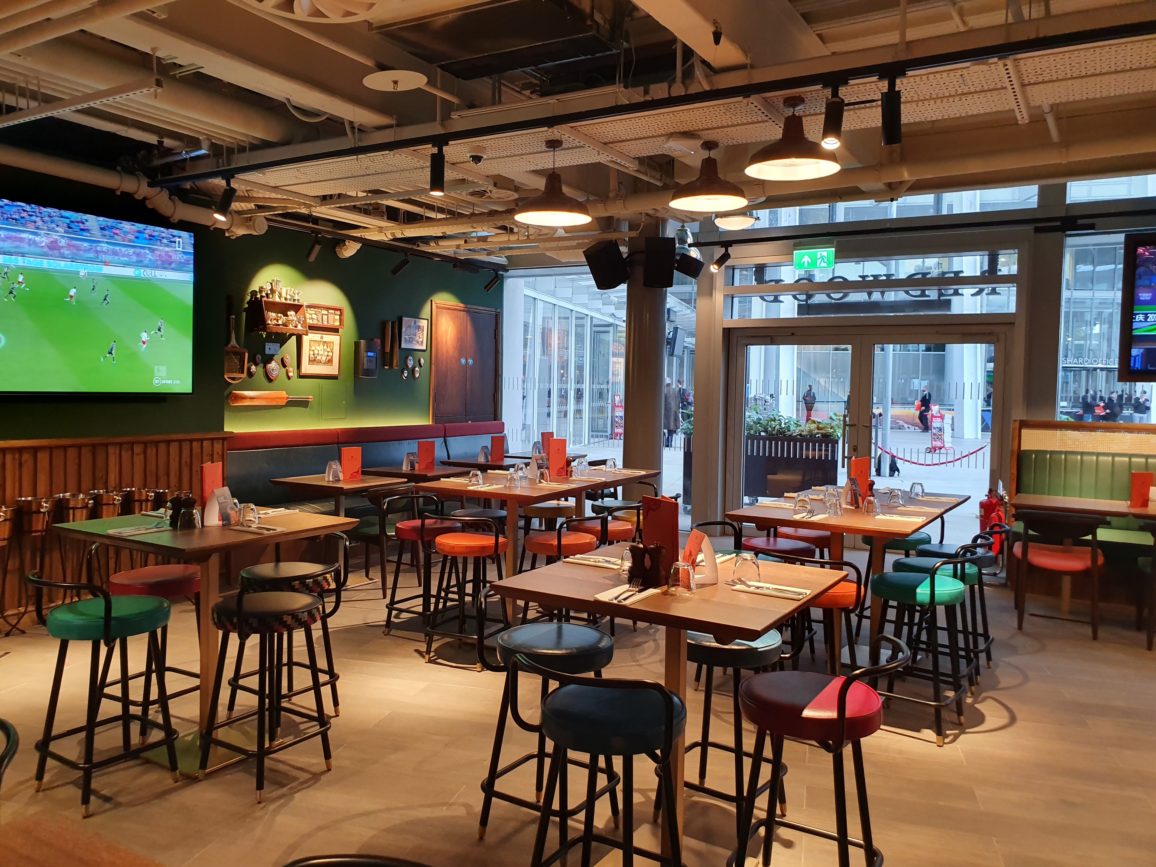 Vibrant dining space at Redwood Sports Pub for casual meetings and events.