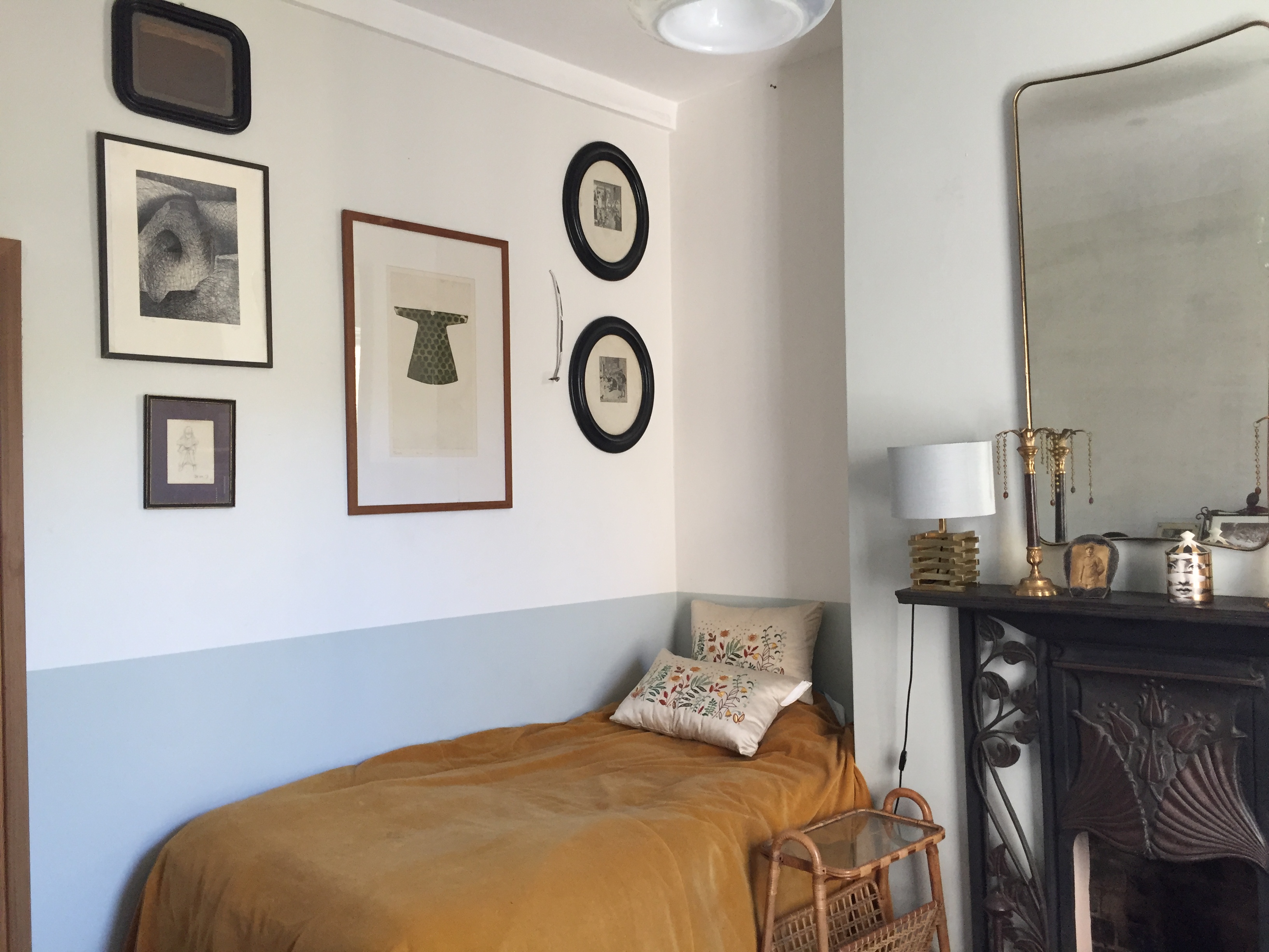 Cozy meeting space in The Little Shop of Wonder with warm lighting and inspiring art.