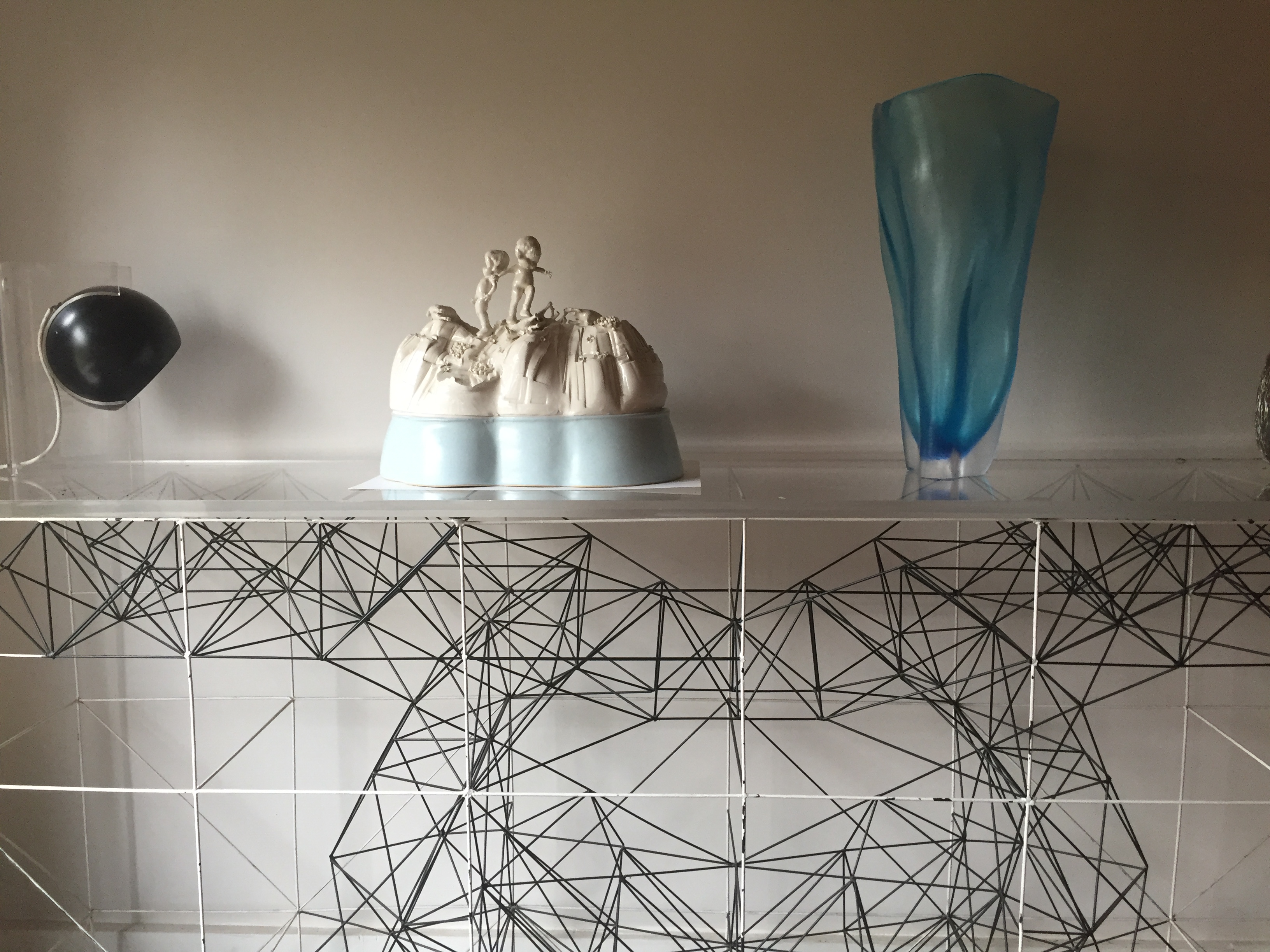 Creative cake display in modern studio for upscale events and celebrations.