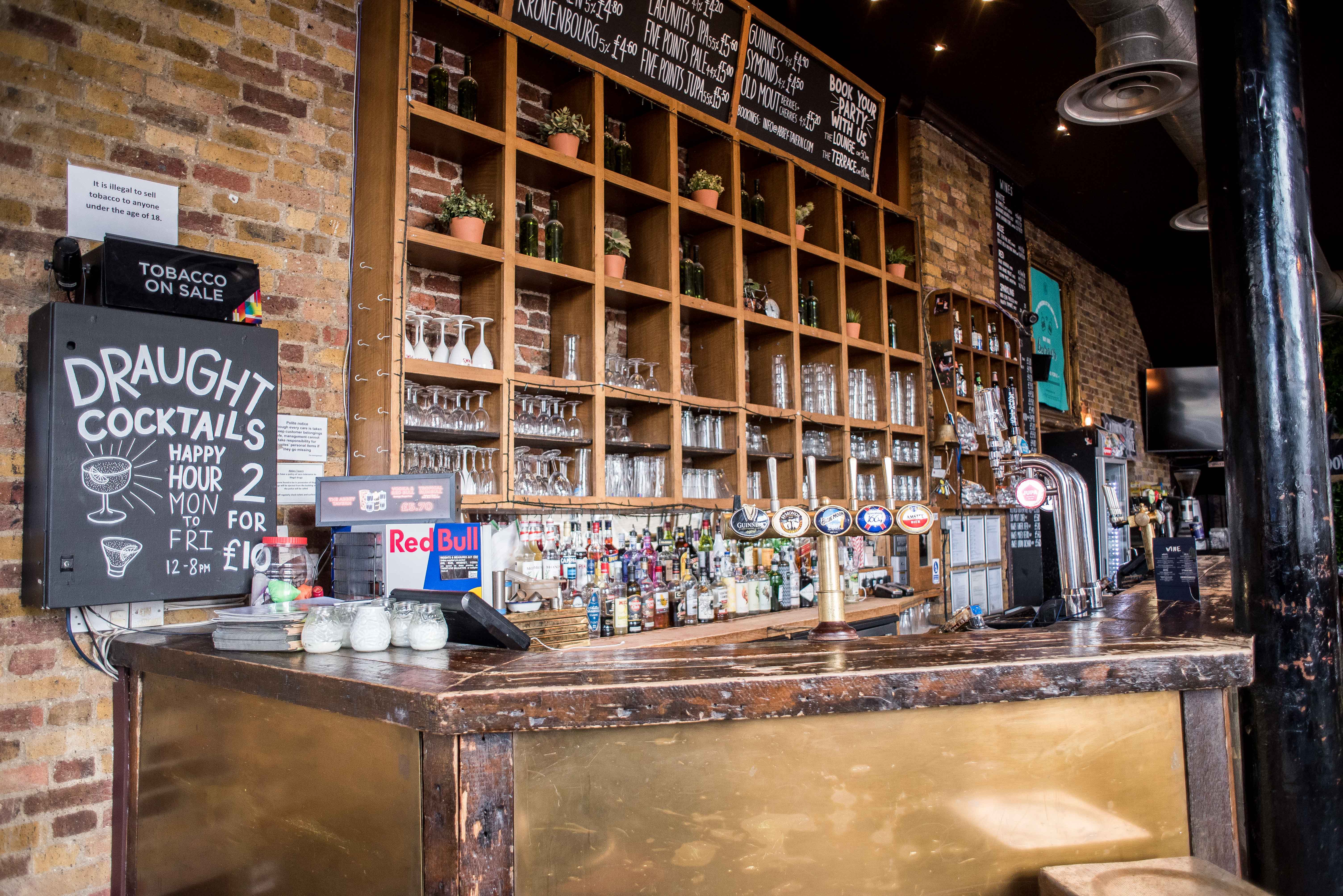 Vibrant bar setup at Abbey Tavern, ideal for networking events and social gatherings.