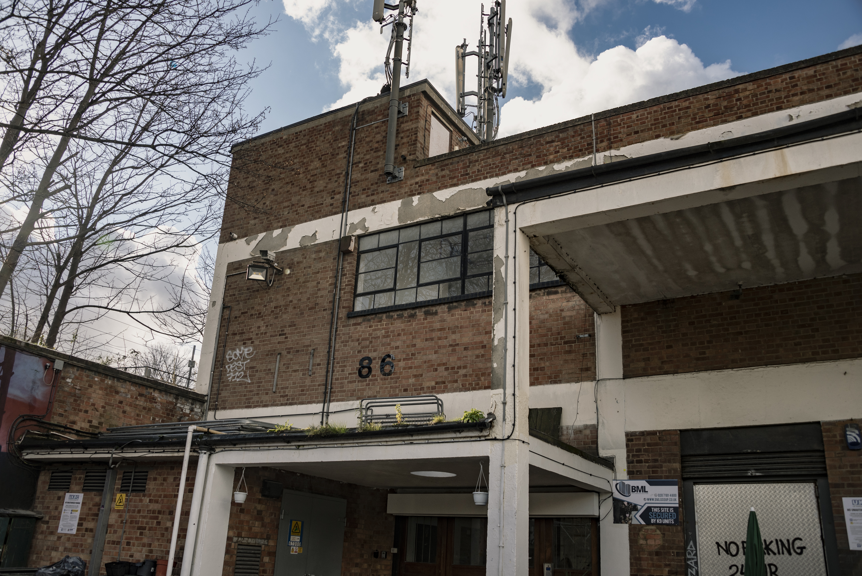 Rustic industrial venue with exposed brick for tech-driven events and creative gatherings.