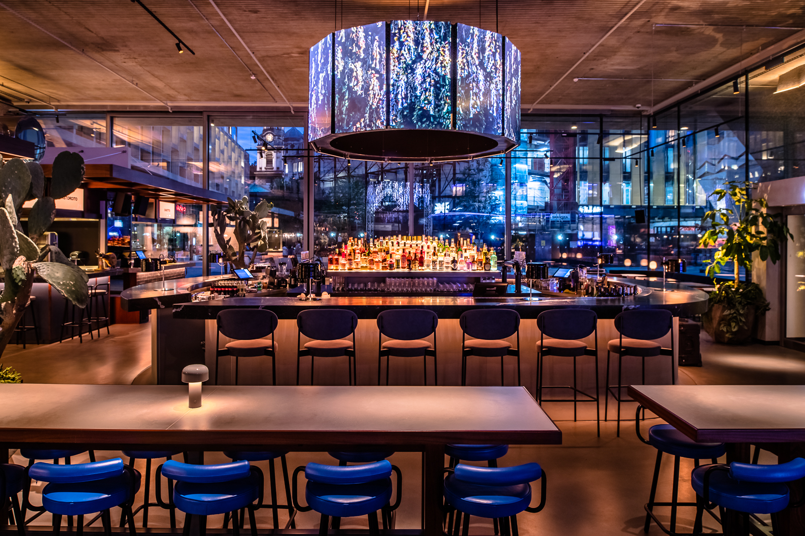 Modern bar with chandelier at Private Hire, Tottenham Court Road for events and gatherings.