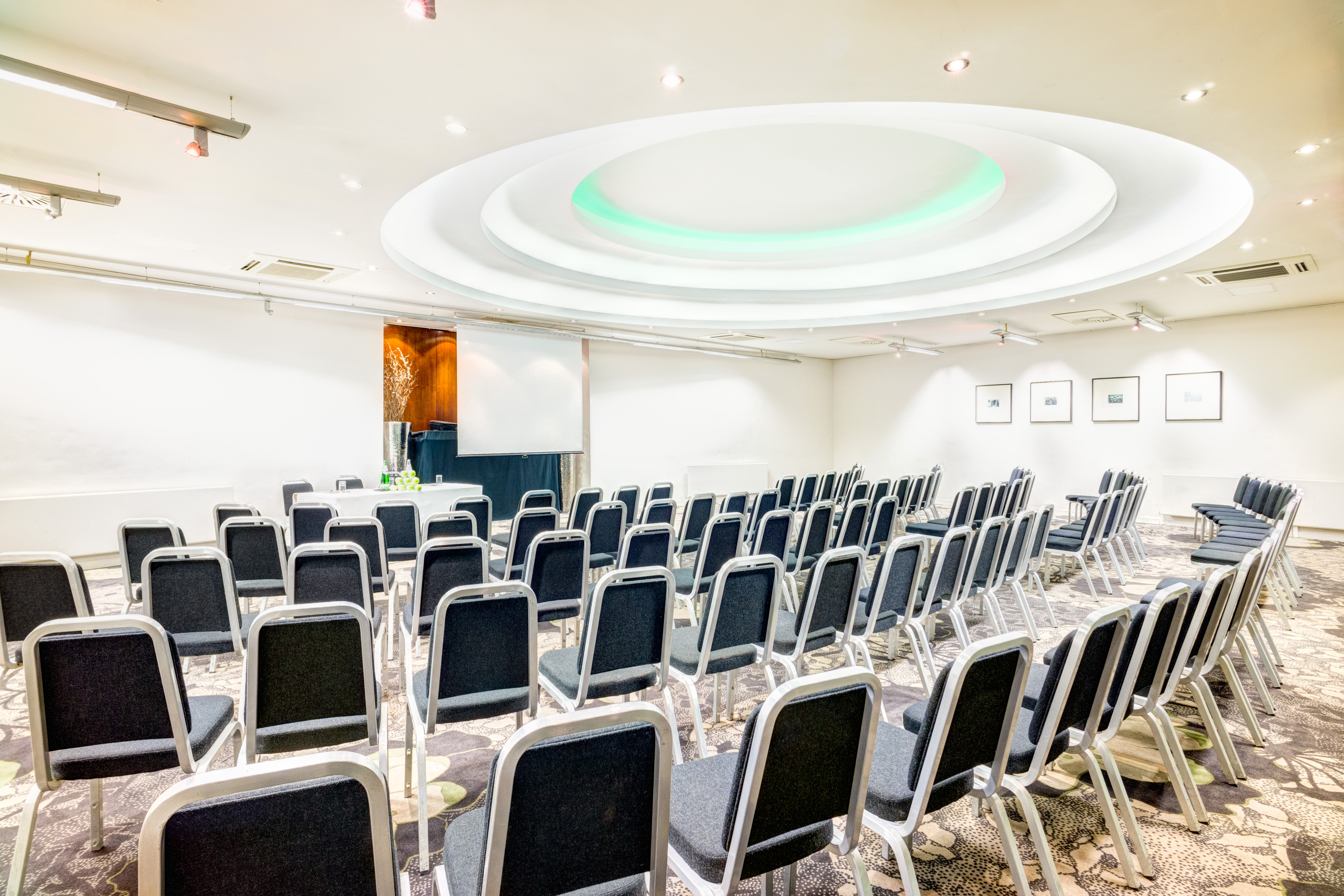 Apex Suite meeting room with modern chairs, ideal for corporate events and workshops.