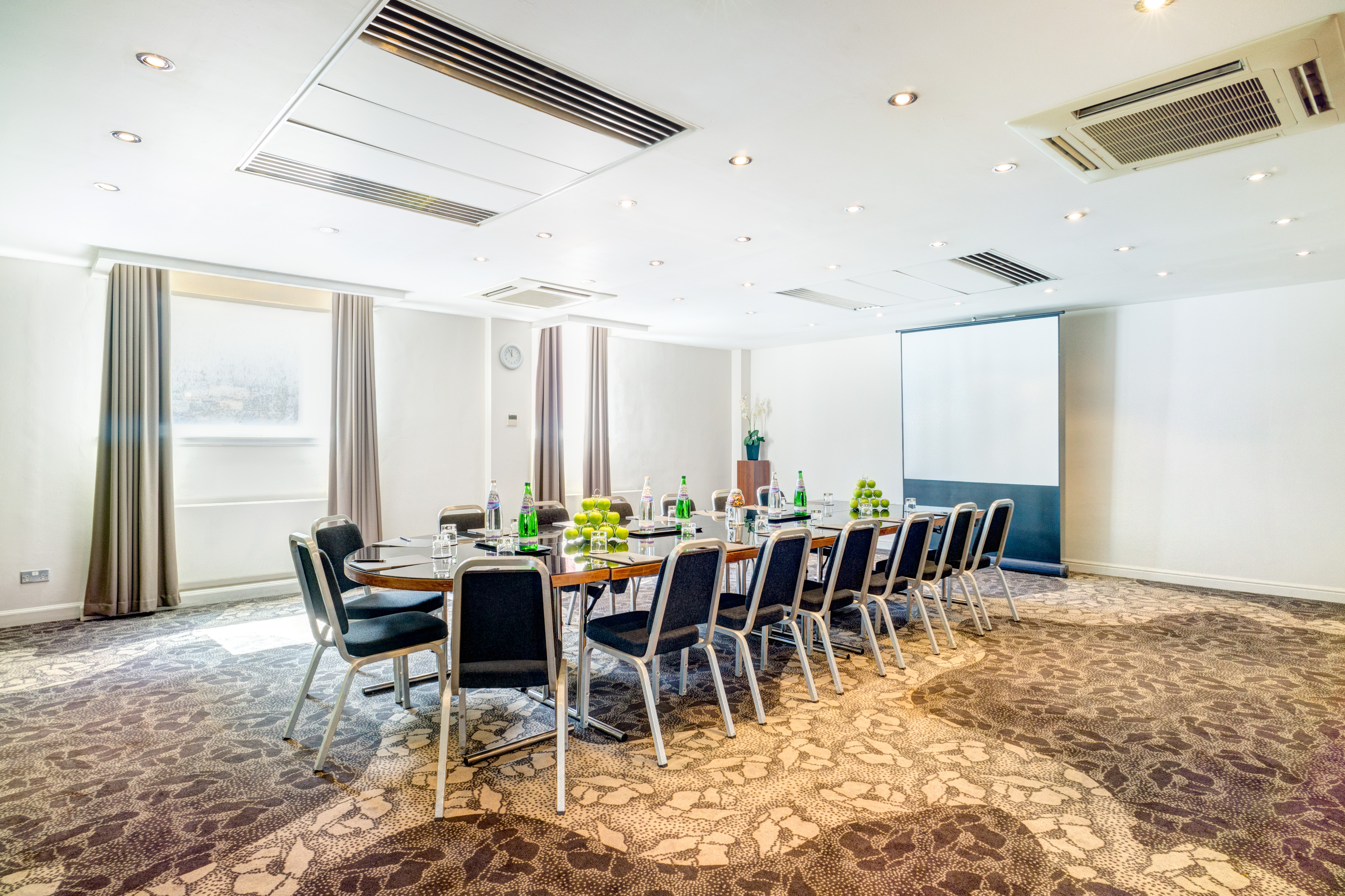 Meeting room at Apex Grassmarket Hotel, ideal for professional gatherings and presentations.