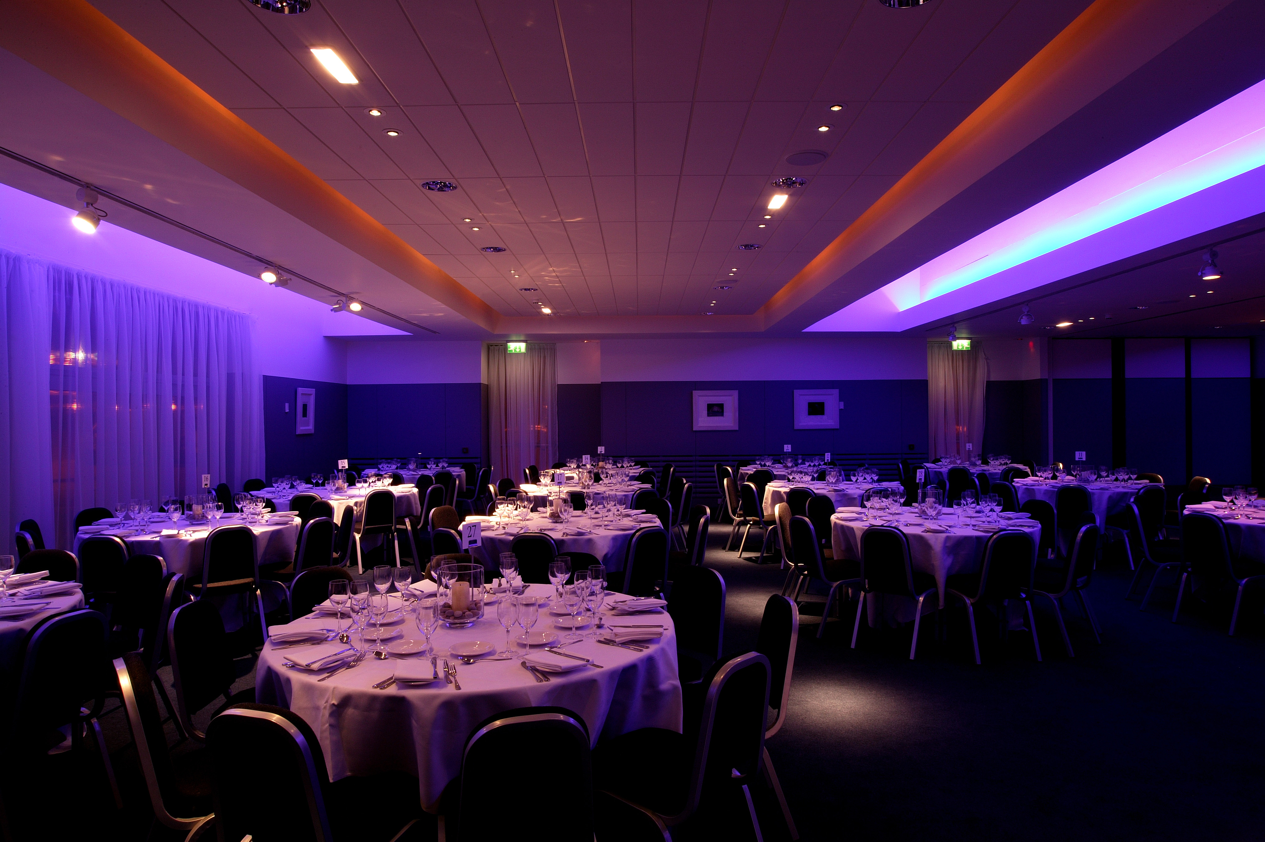 City Quay Suite banquet hall with elegant tables, perfect for formal events and celebrations.