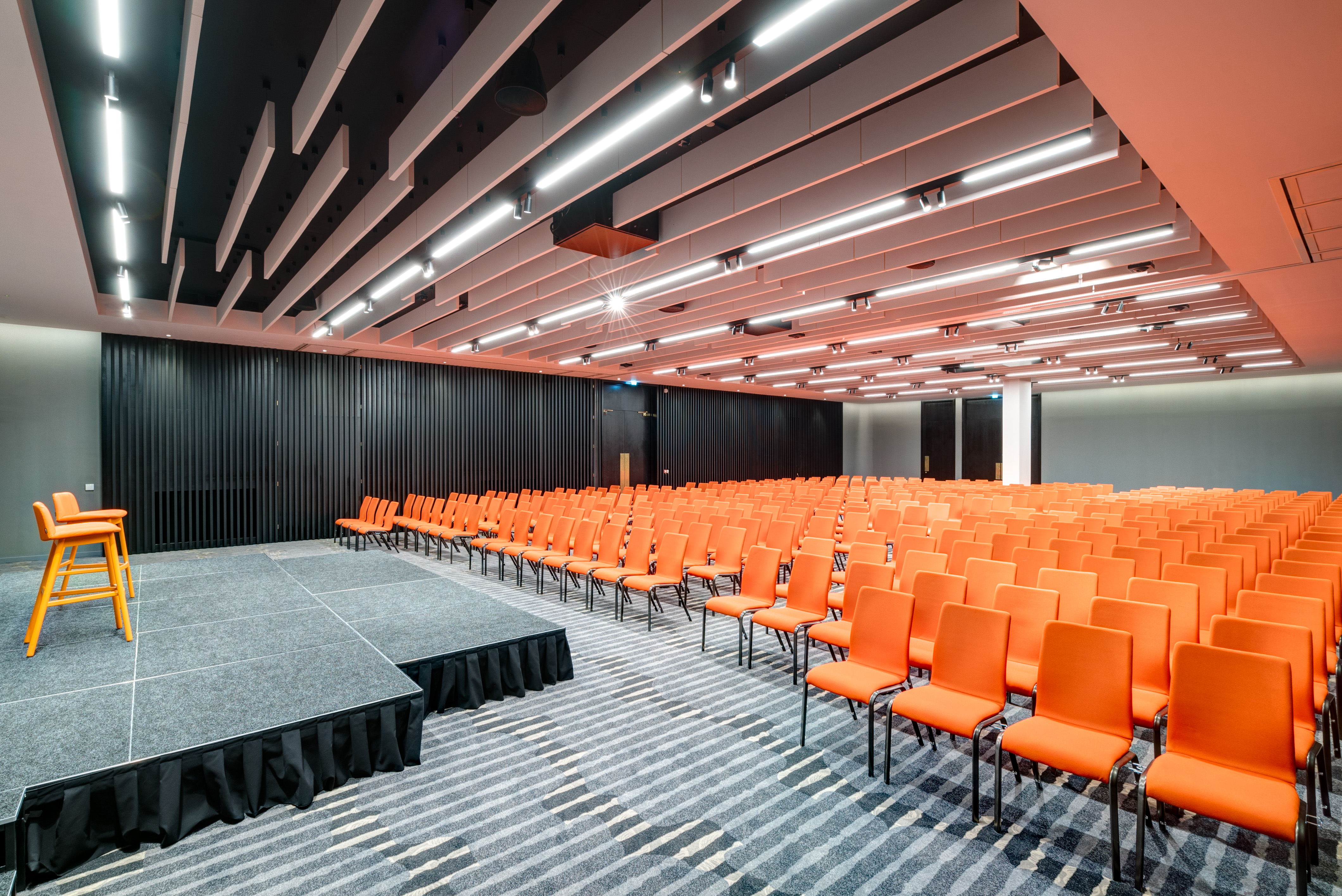 Lansdown Suite at Apex City of Bath Hotel, vibrant orange chairs for conferences.