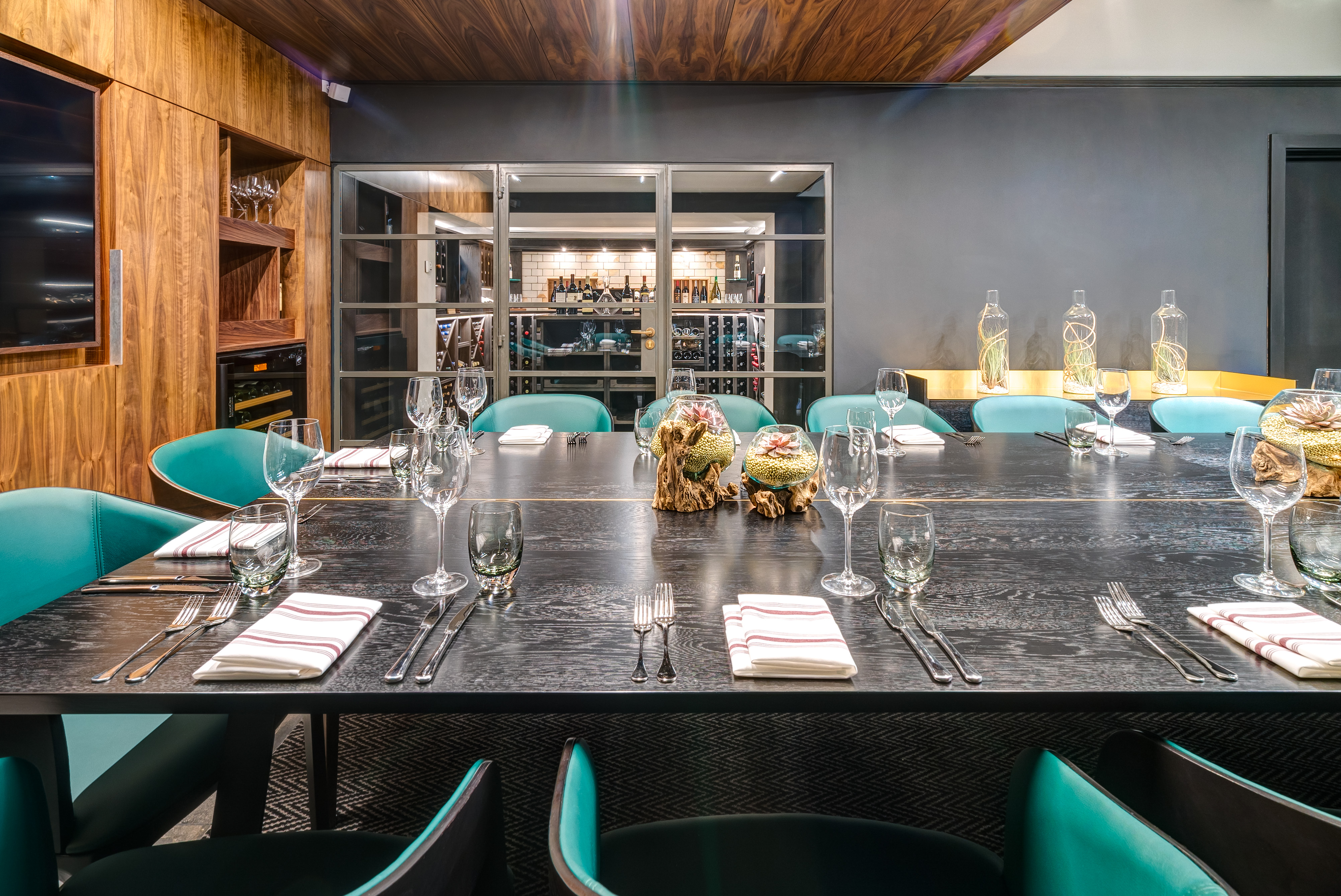 Sophisticated meeting space with dark wood table at Apex Temple Court Hotel.