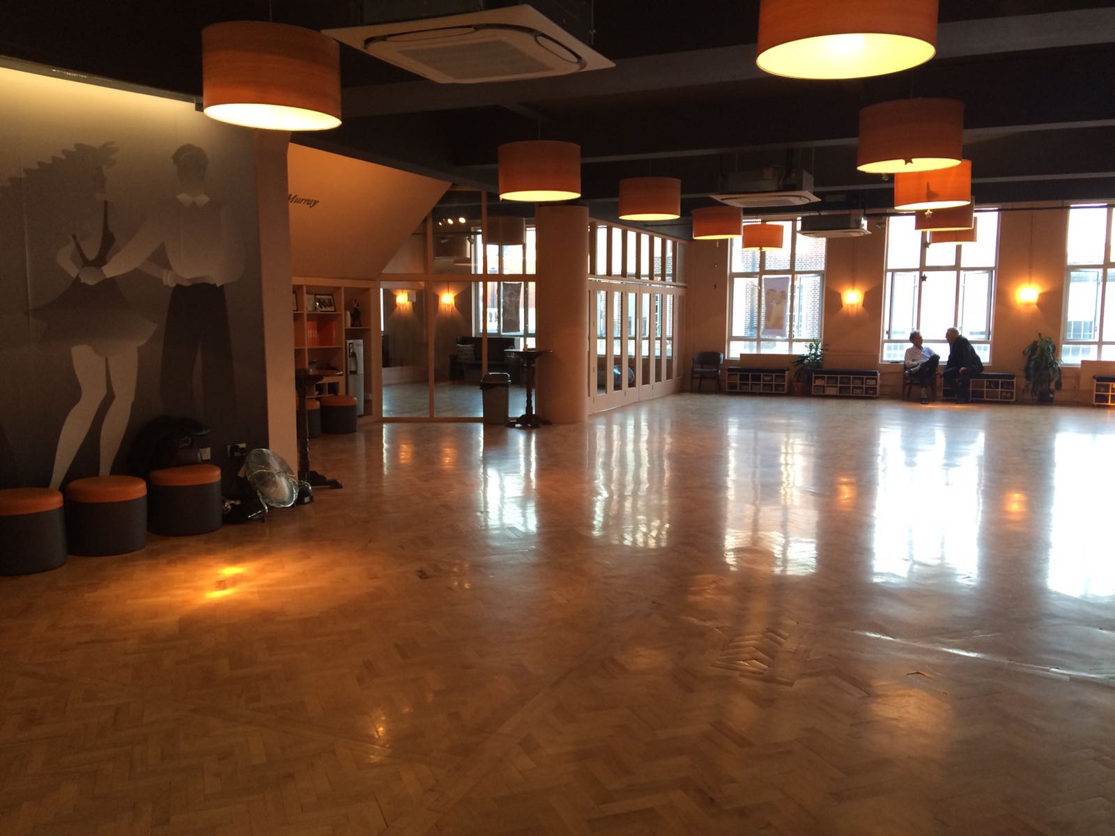 Spacious STARDOM Dance Studios with polished wooden floor, ideal for events and workshops.